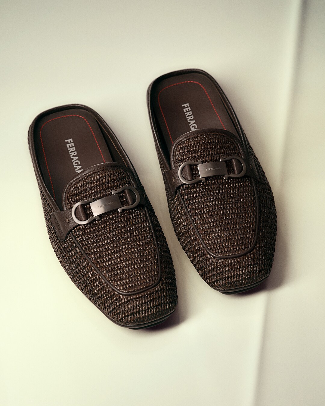 Elegant display of Ferragamo men's luxury shoe collection showcasing various styles and premium leather finishes