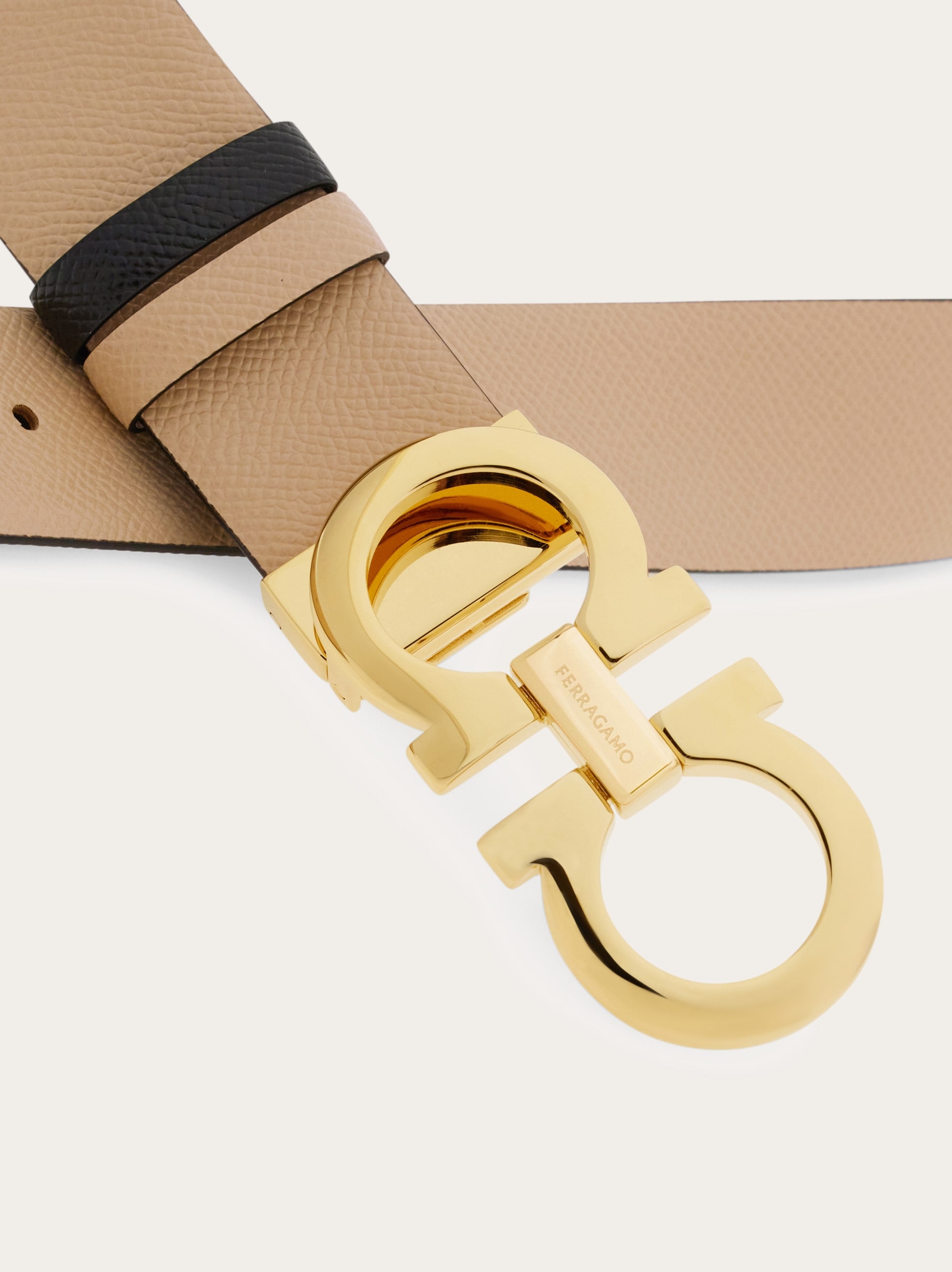 Reversible and adjustable Gancini belt - Women | Ferragamo
