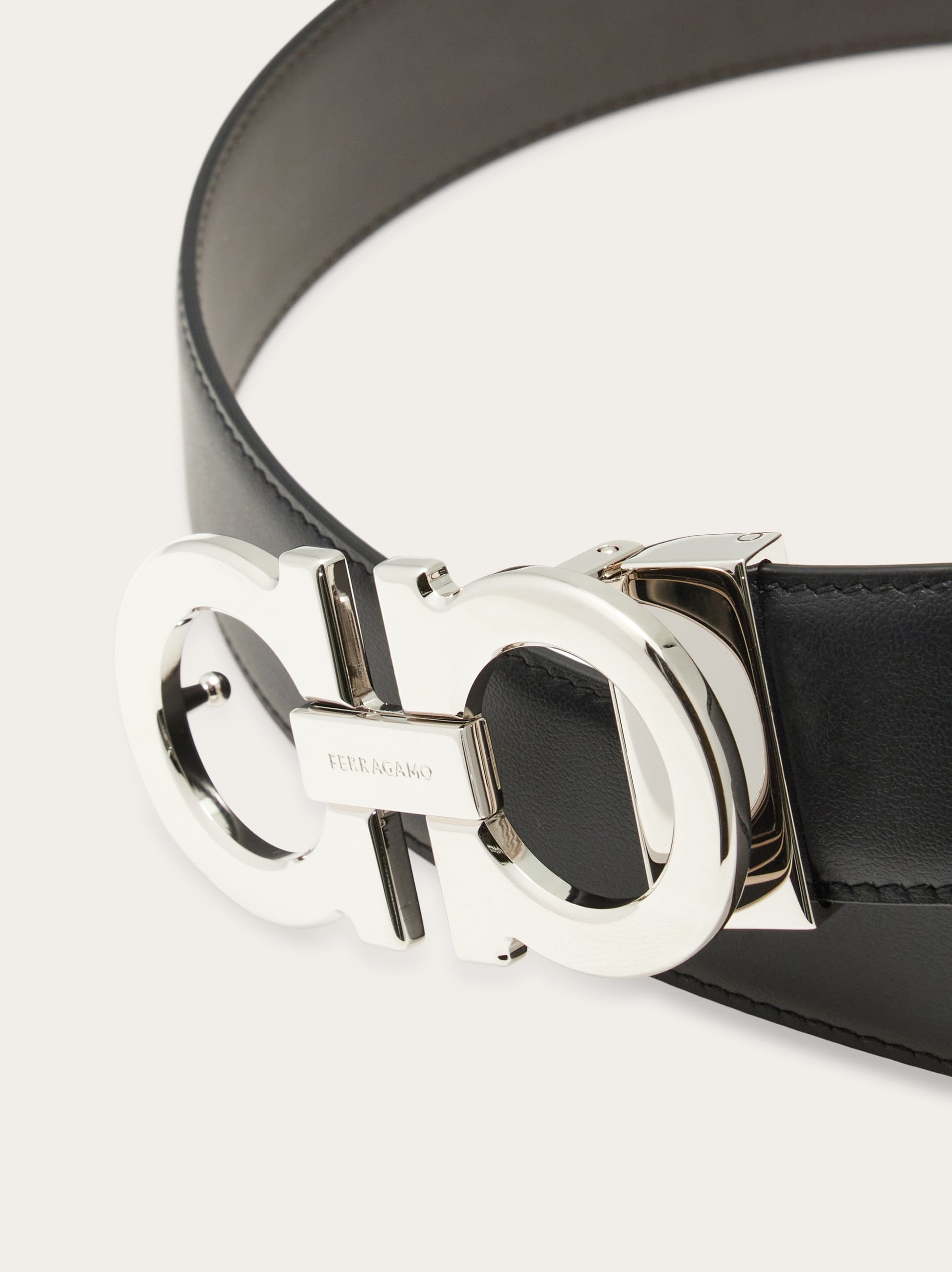 Reversible and adjustable Gancini belt - Men | Ferragamo
