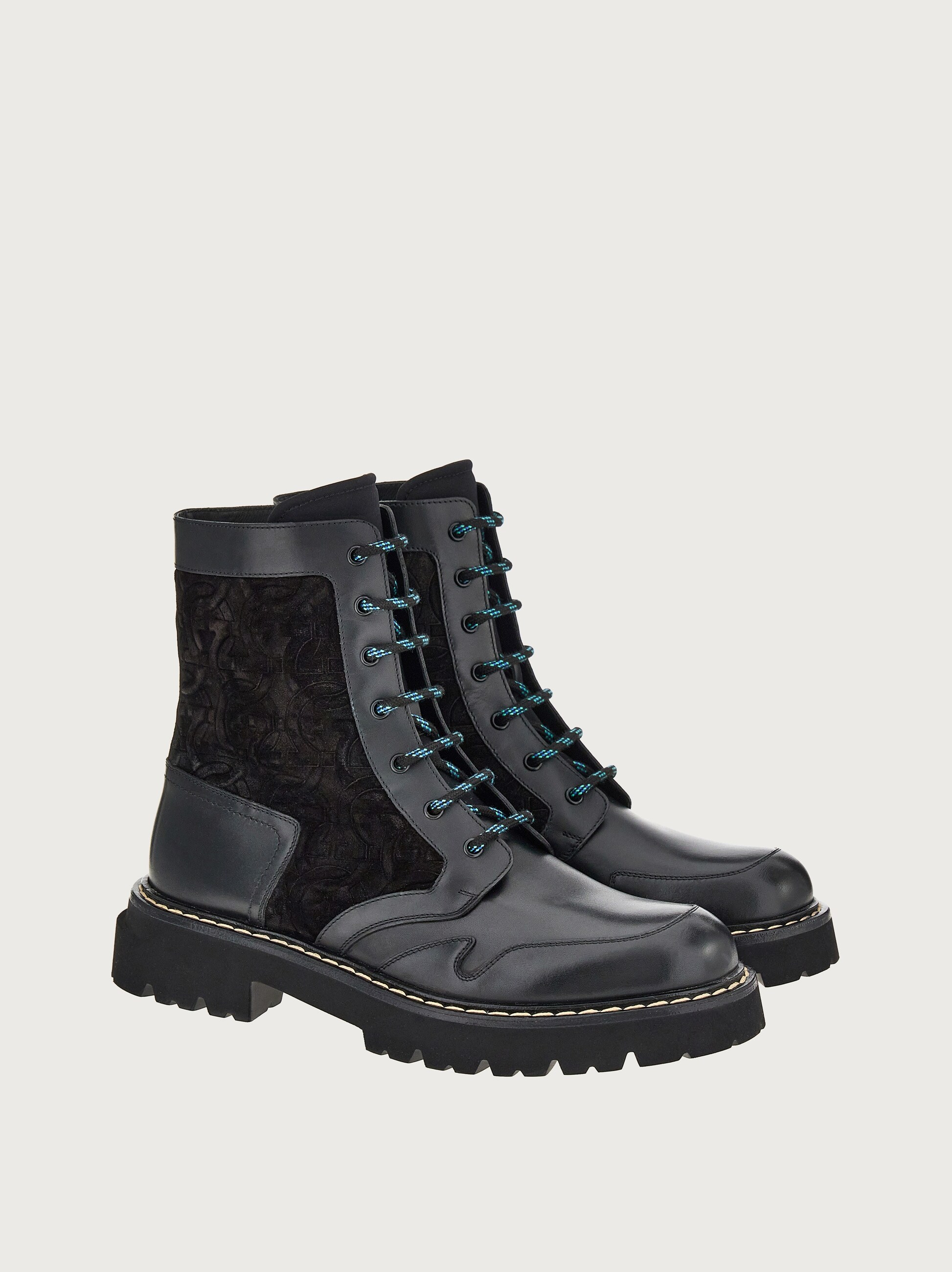 Combat boot with Gancini ornament 
