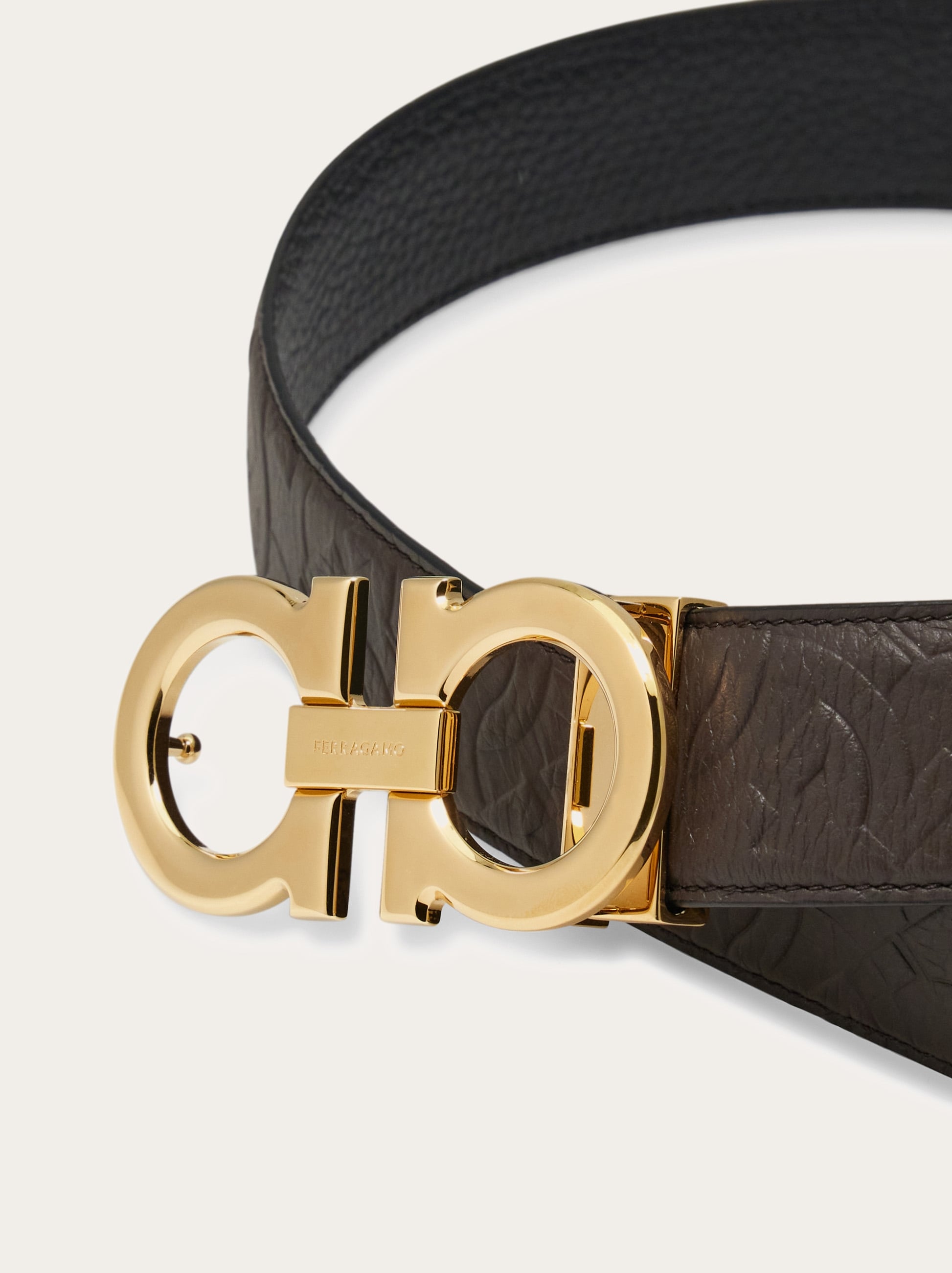 Reversible and adjustable Gancini belt - Men | Ferragamo