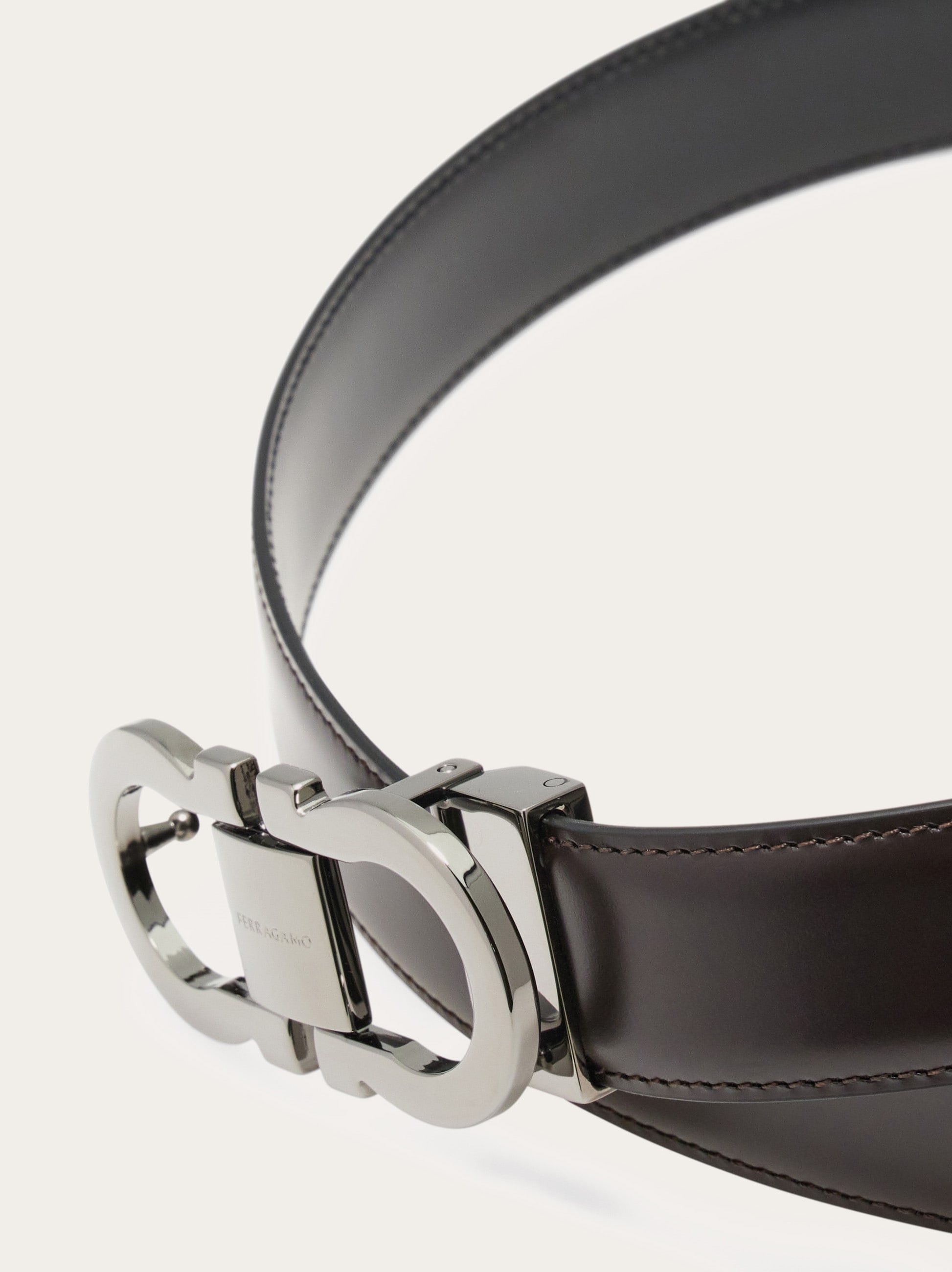 FERRAGAMOベルト Reversible and adjustable Gancini belt - Men | Ferragamo