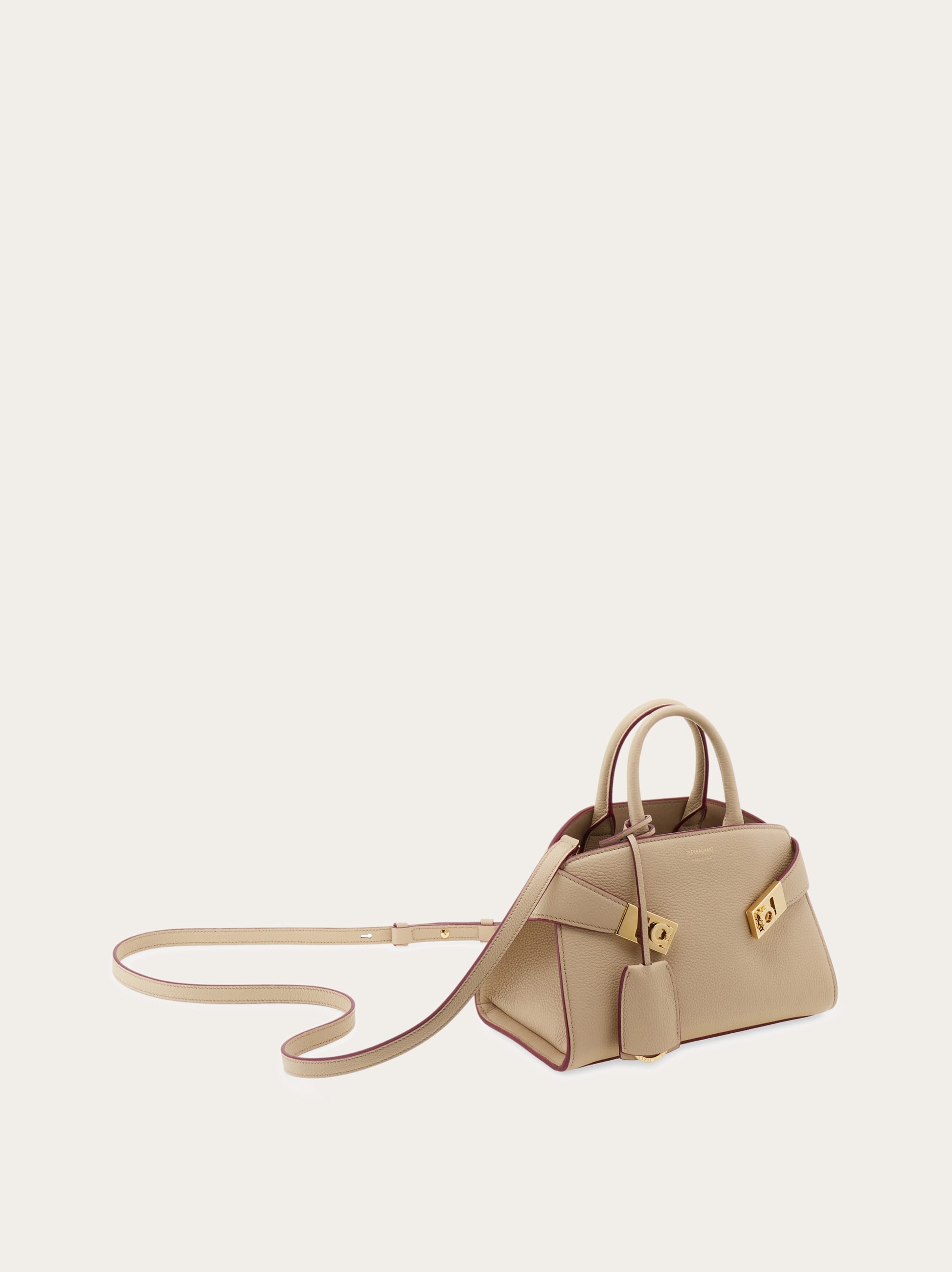 【送料&関税込】Ferragamo Gold Hug Mini Bag Ferragamo Hug mini bag for Women - Gold in UAE | Level Shoes