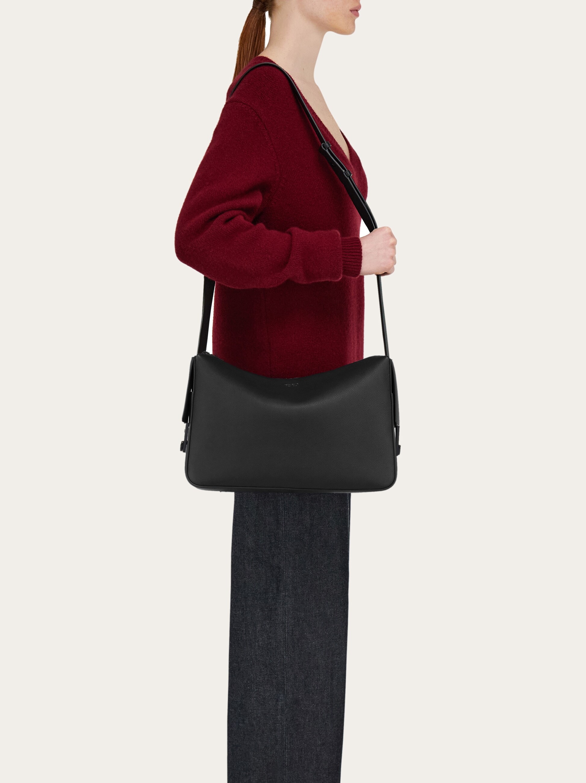 Messenger bag with Gancini buckles (M) - Men | Ferragamo