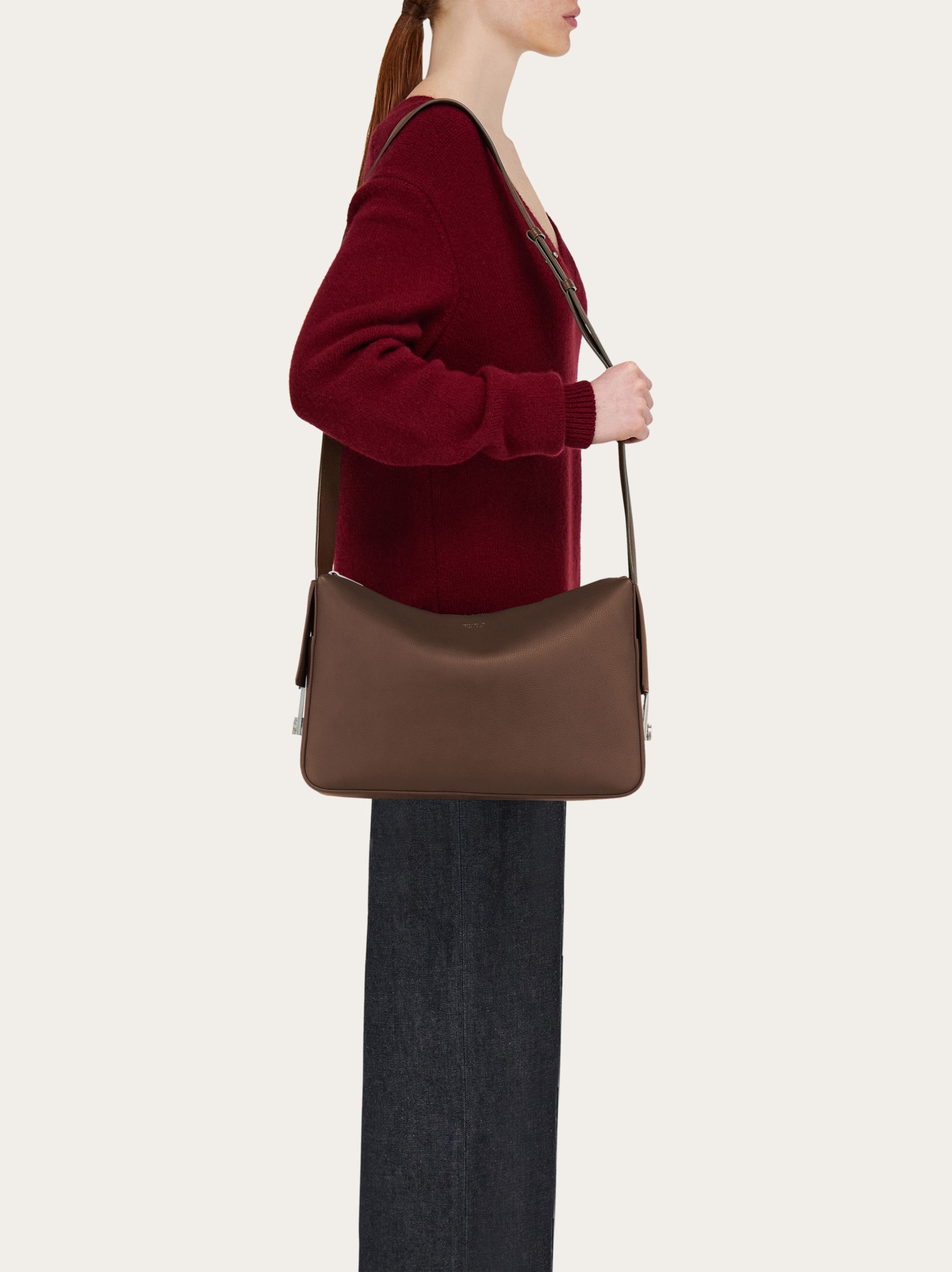 Messenger bag with Gancini buckles (M) - Men | Ferragamo