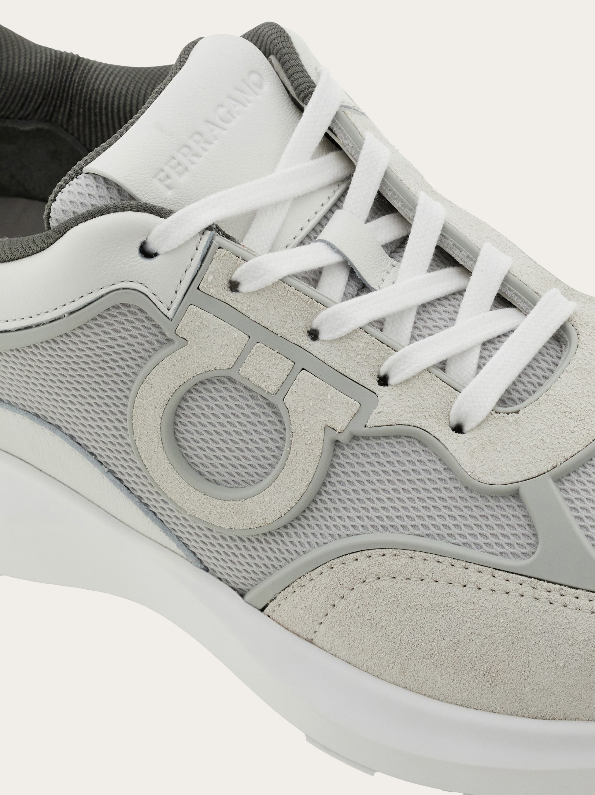 スニーカー FERRAGAMO Men Sneakers White 029826 779355 BIANCO Low top sneaker with Gancini ornament - Men | Ferragamo