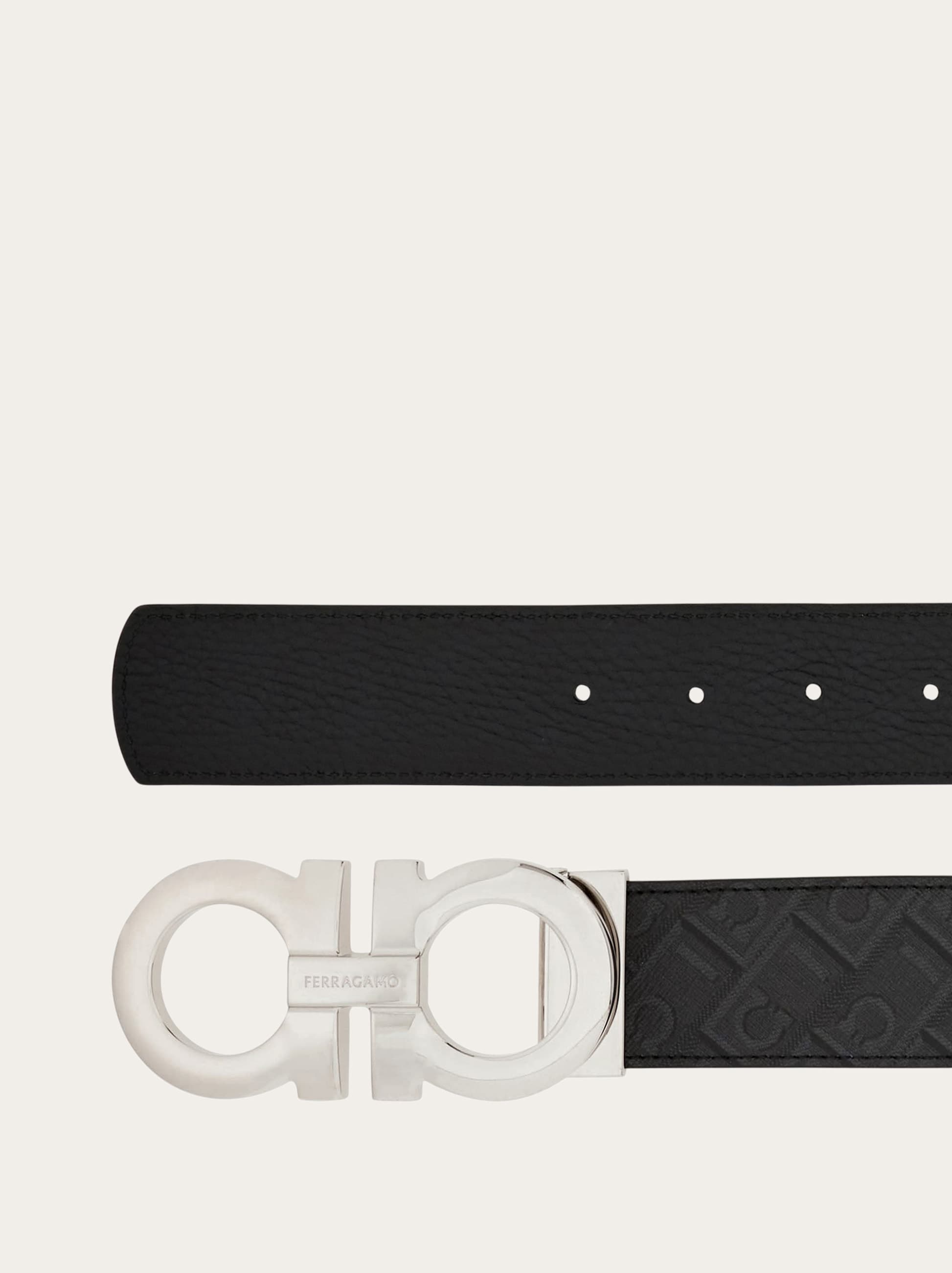 Salvatore Ferragamoレザーベルト ブラック×オフホワイト Reversible and adjustable Gancini belt - Men | Ferragamo