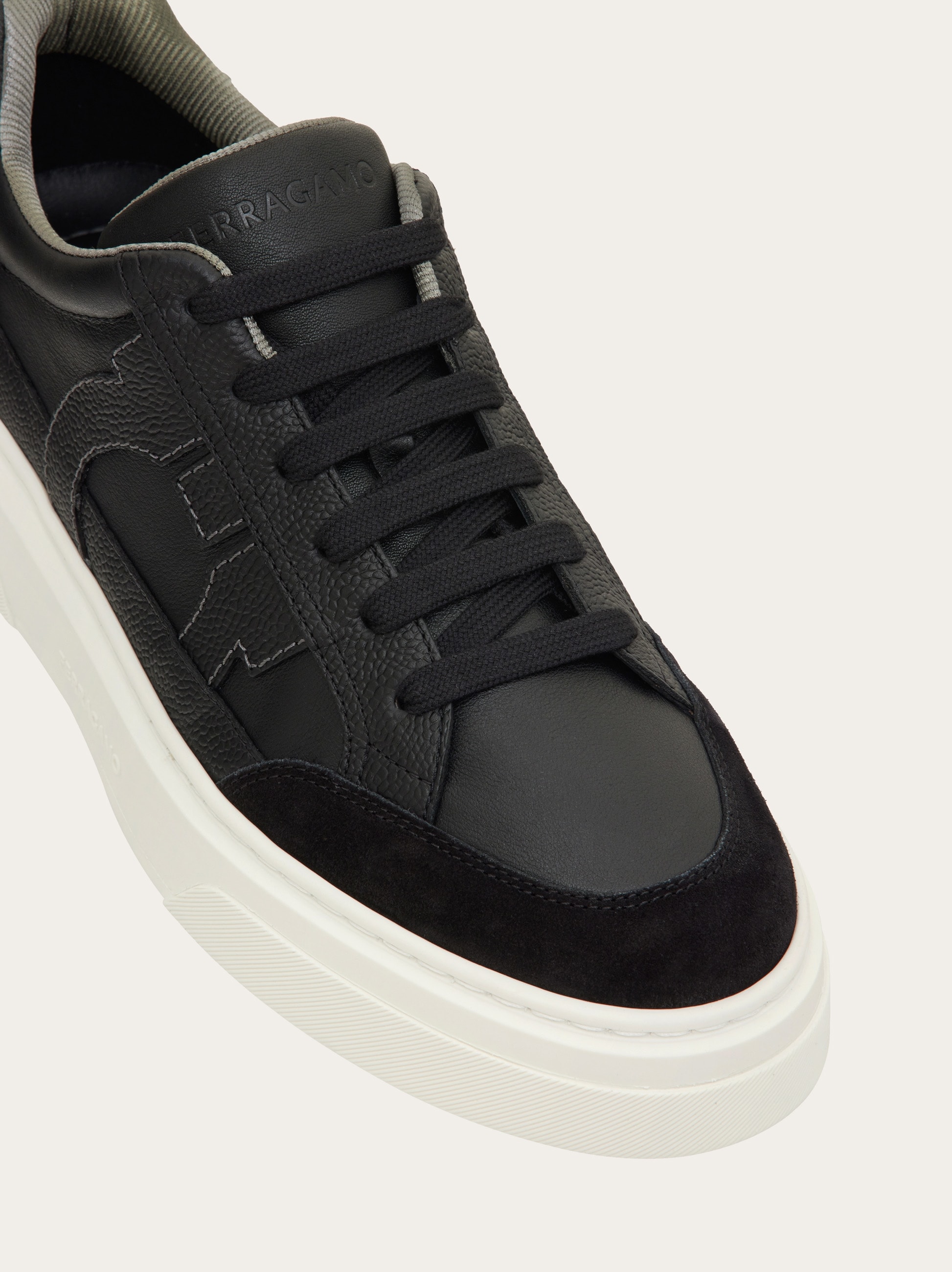 Low top sneaker with Gancini ornament - Men | Ferragamo