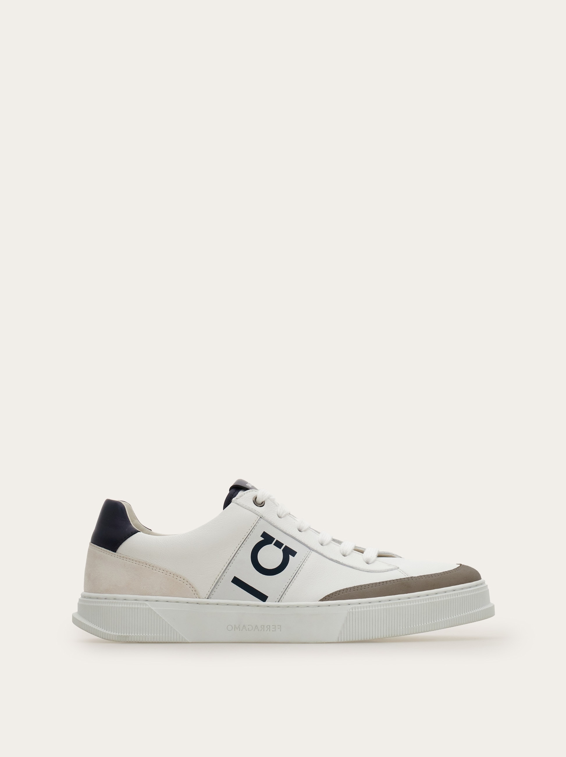 Low-top sneaker with Gancini detail - Men | Ferragamo