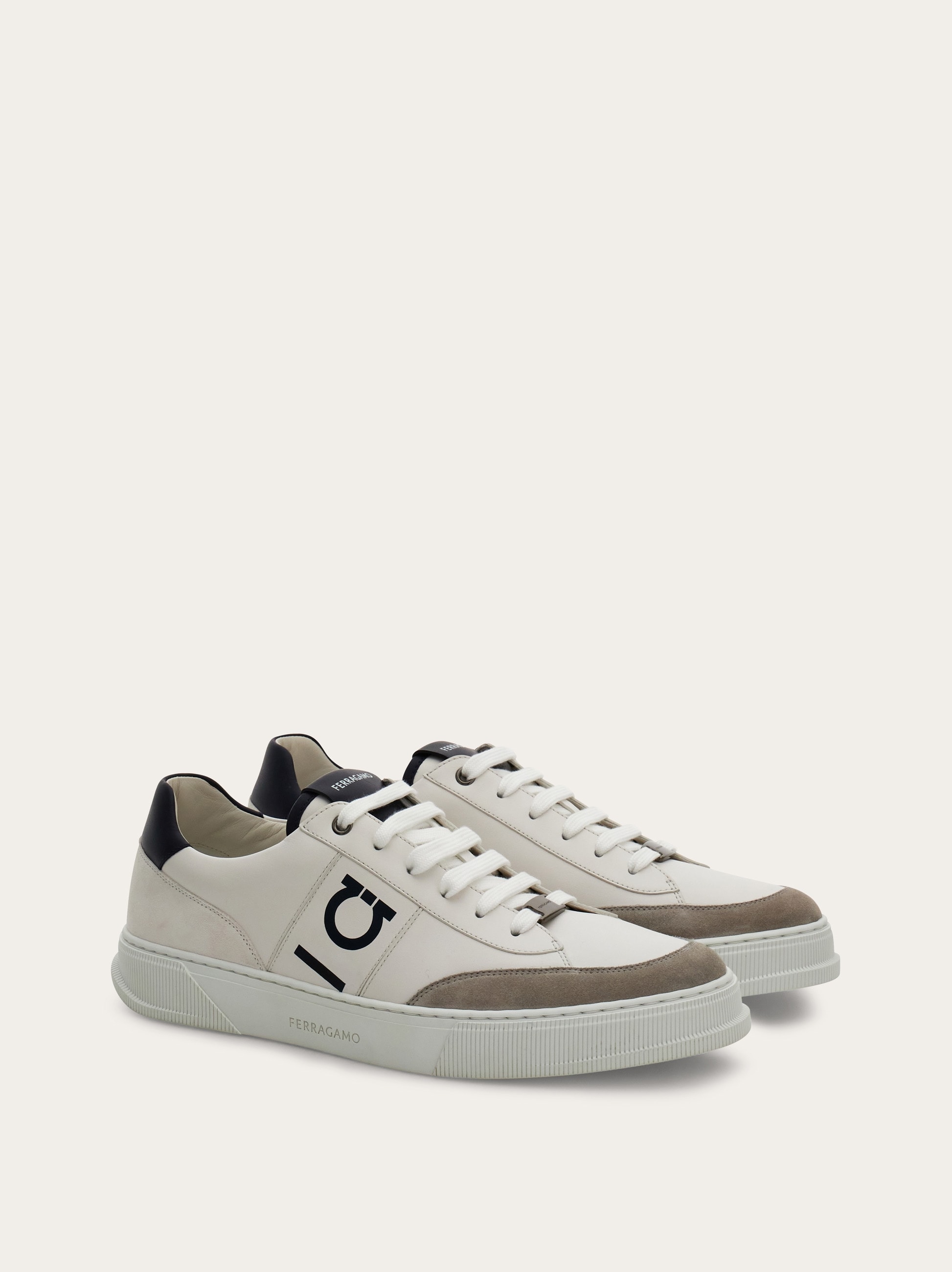 Low-top sneaker with Gancini detail - Men | Ferragamo