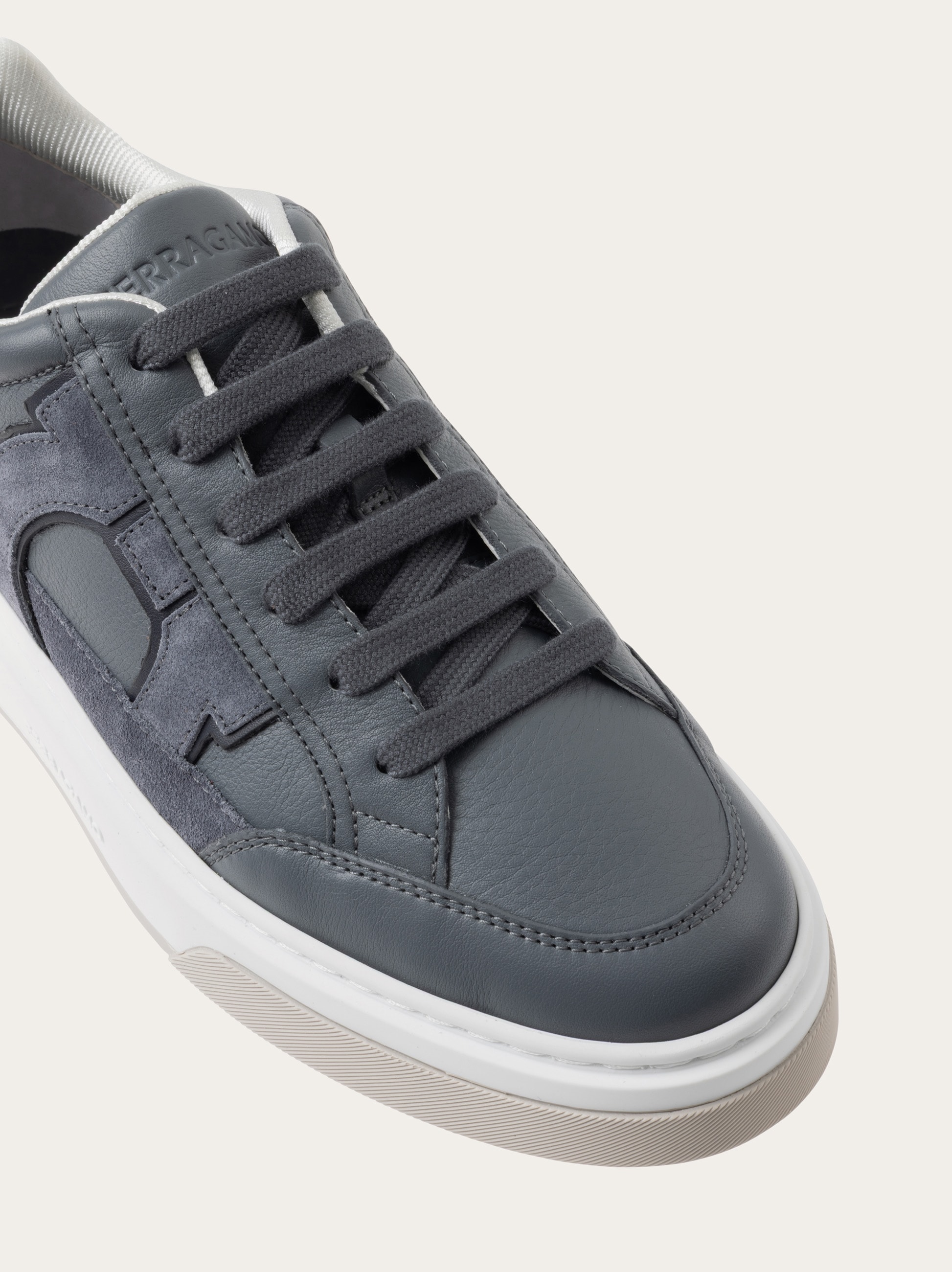 【送料&関税込】Ferragamo gancini Low-top Sneakers Low top sneaker with signature - Men | Ferragamo