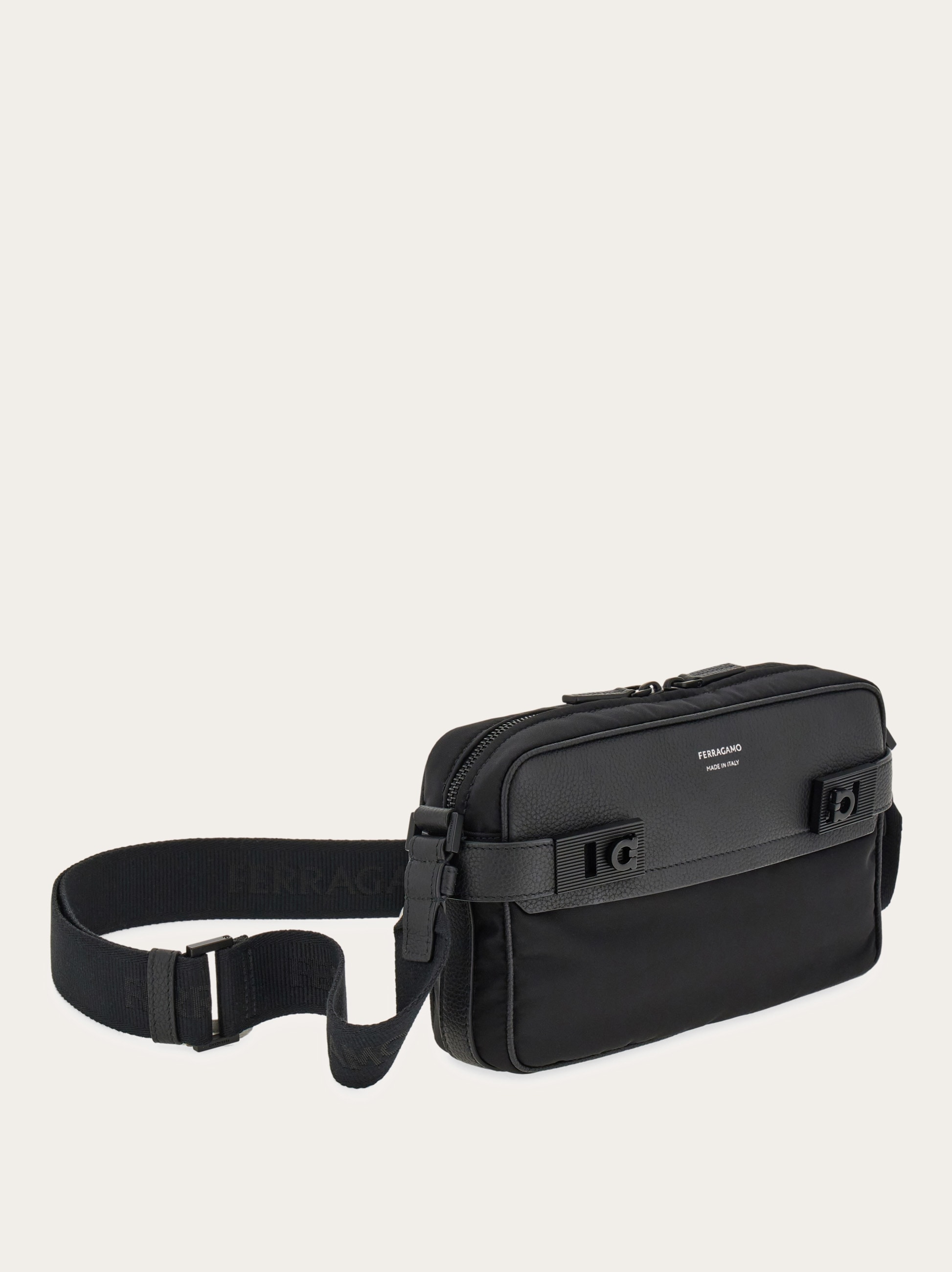 Crossbody bag with Gancini buckles - Men | Ferragamo