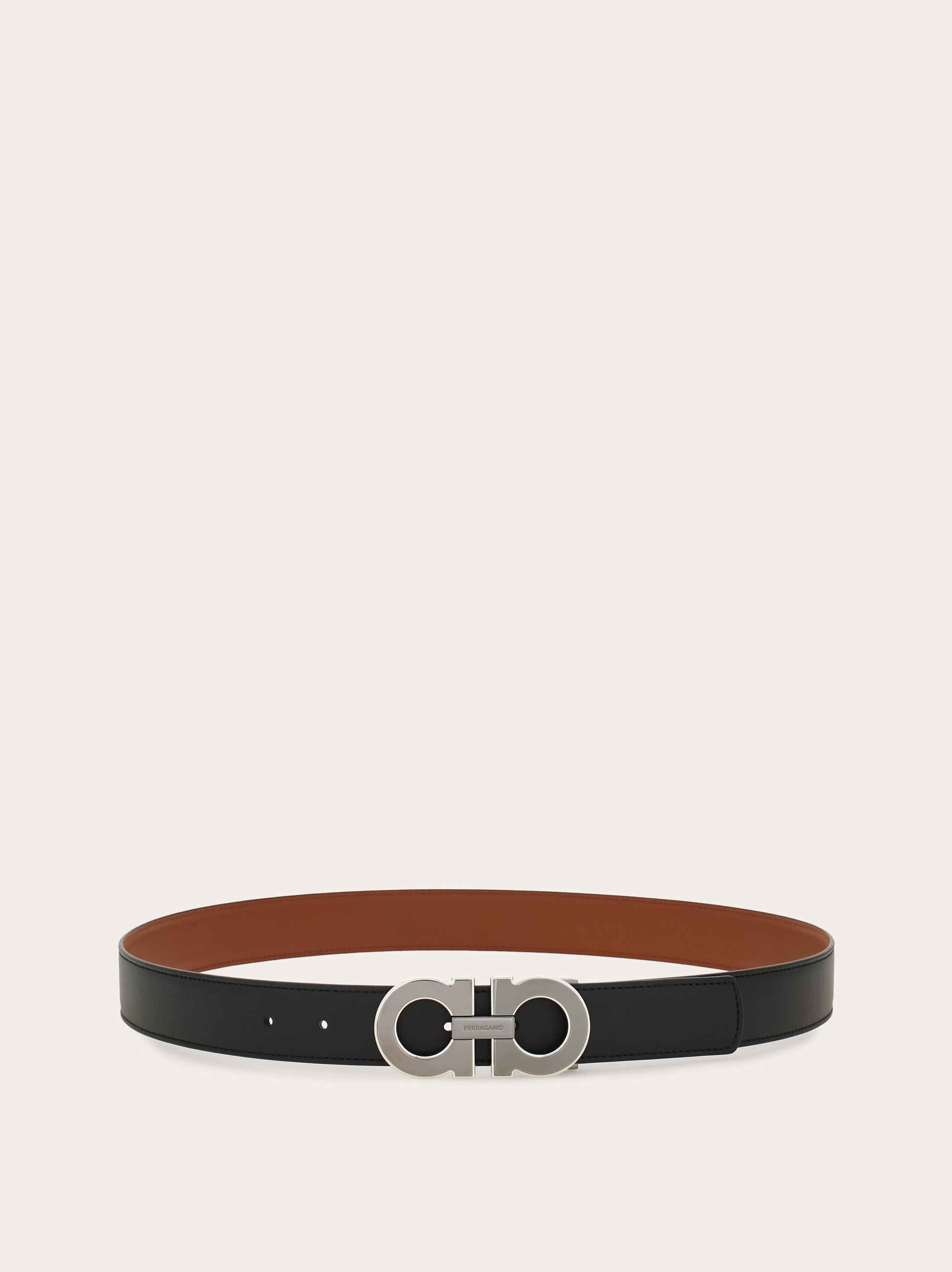 Reversible and adjustable Gancini belt - Men | Ferragamo