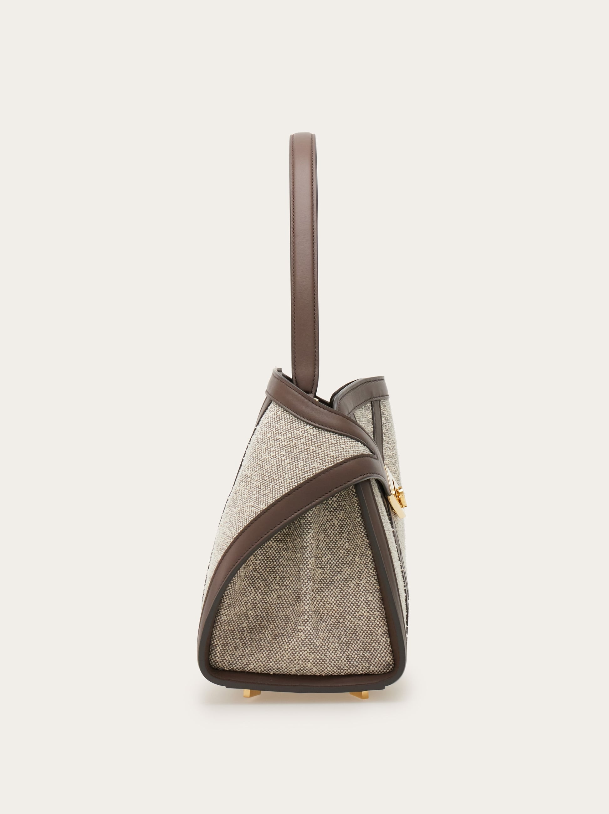 Hug soft shoulder bag with leather trims (M) - Women | Ferragamo