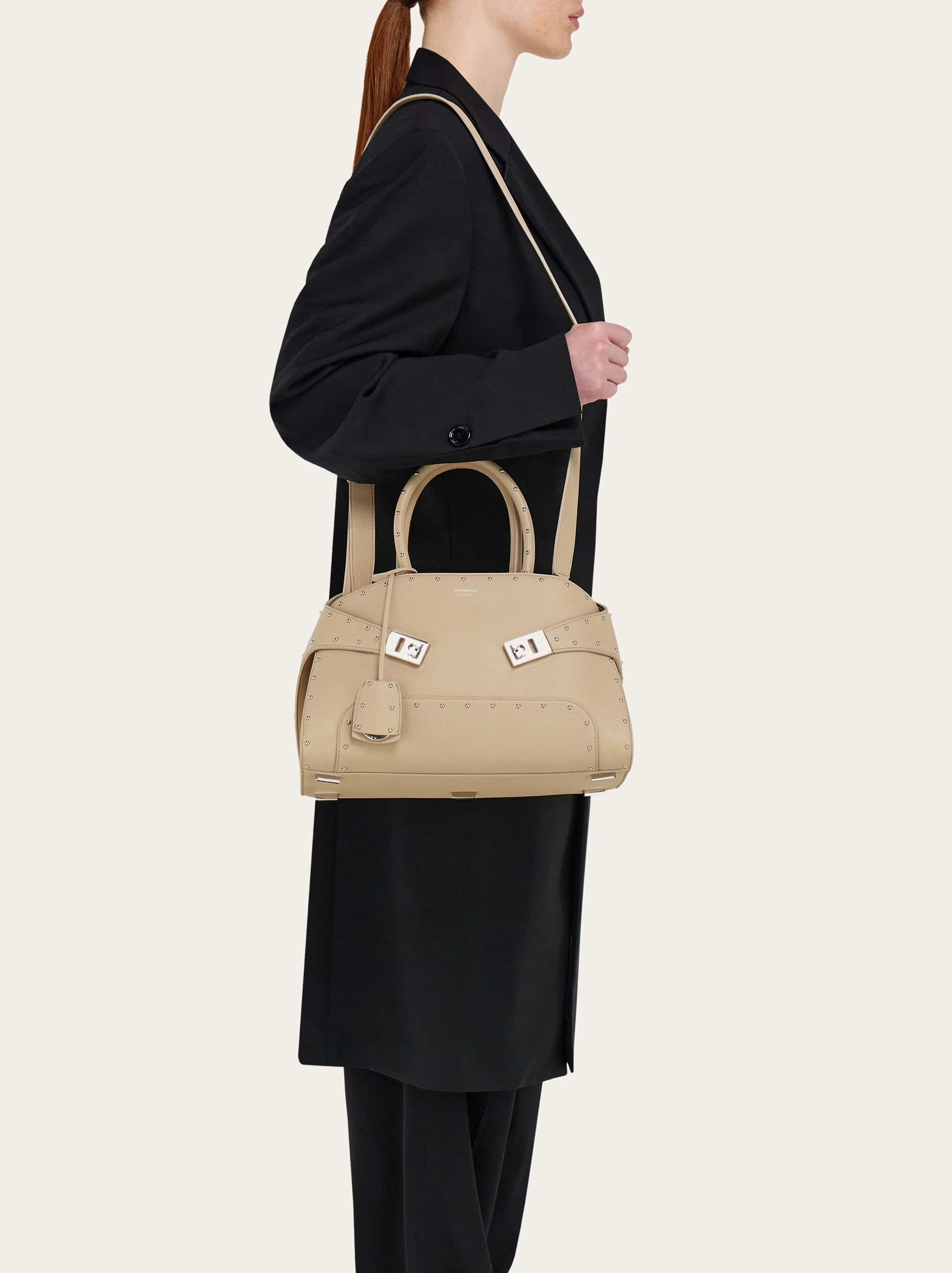 Hug handbag with studs (M) - Women | Ferragamo