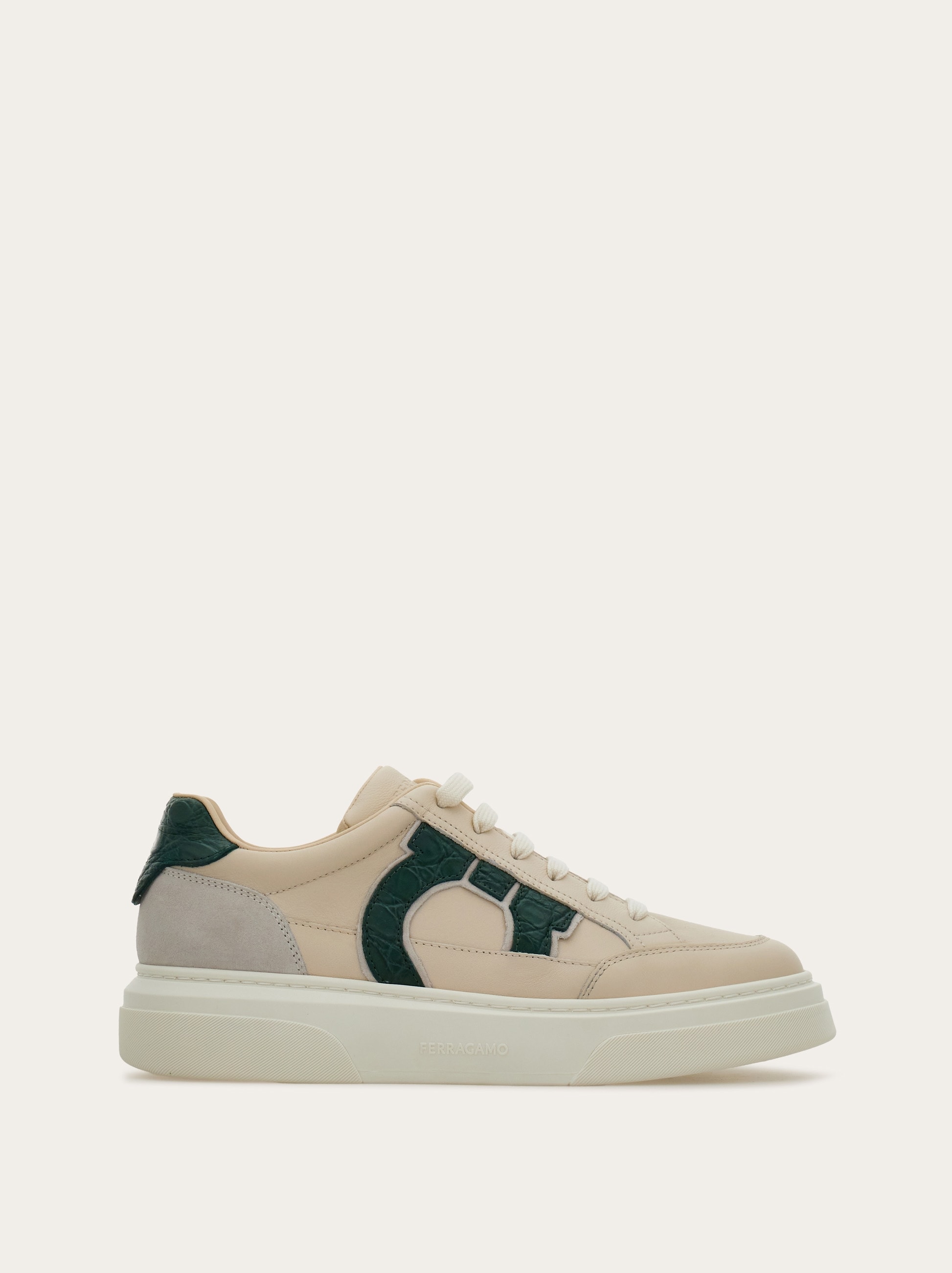 Low-top sneaker with Gancini detail - Men | Ferragamo