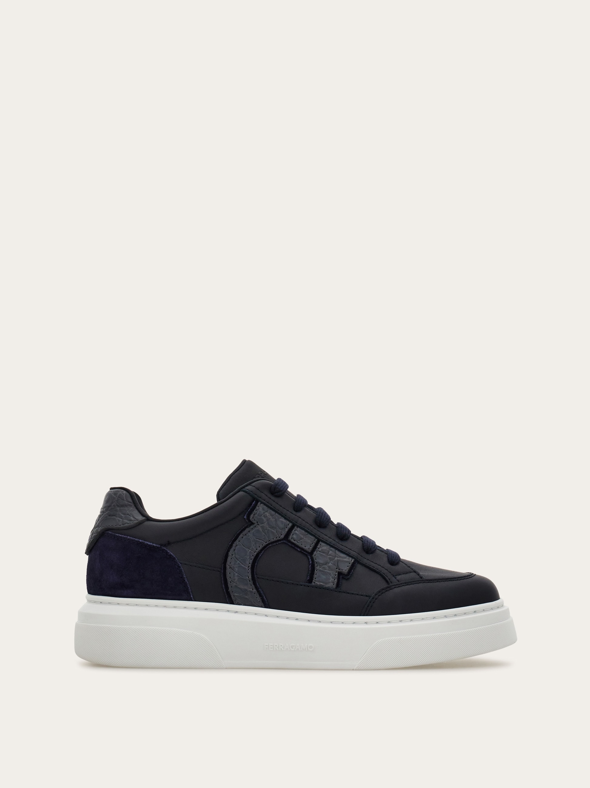 Low-top sneaker with Gancini detail - Men | Ferragamo