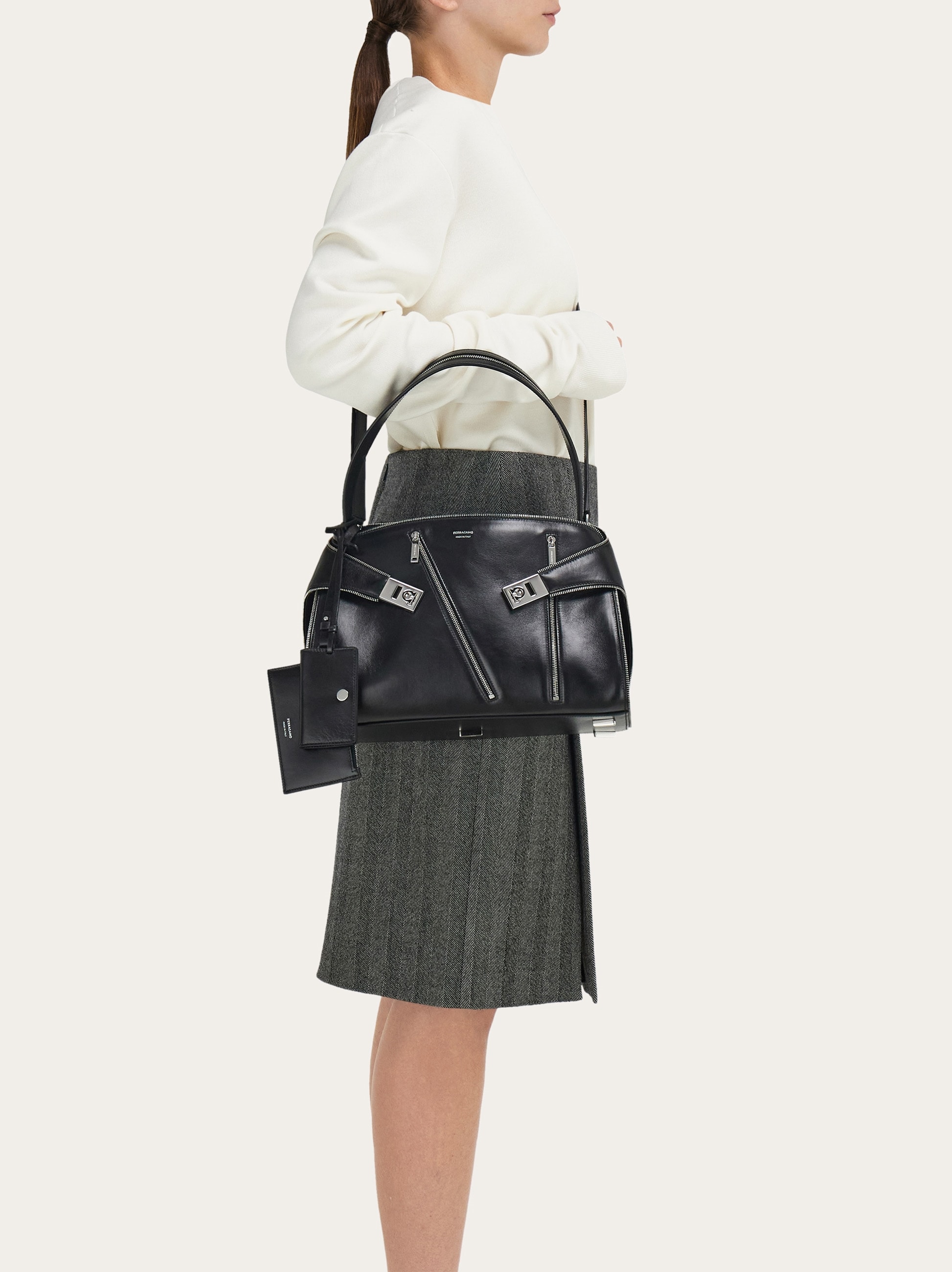 Hug soft shoulder bag multi-zip (M) - Women | Ferragamo