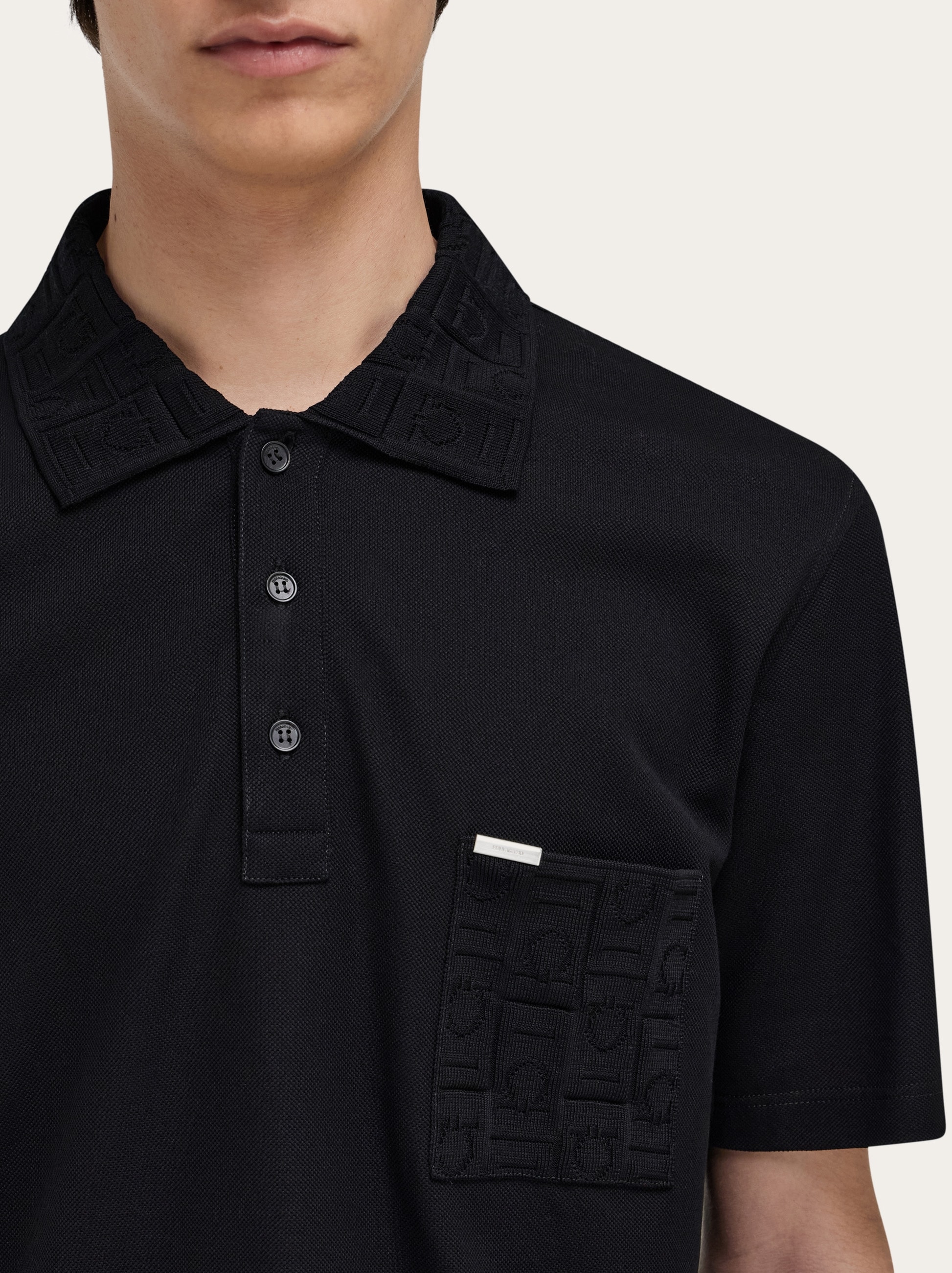 V-neck polo with jacquard pocket detail - Men | Ferragamo