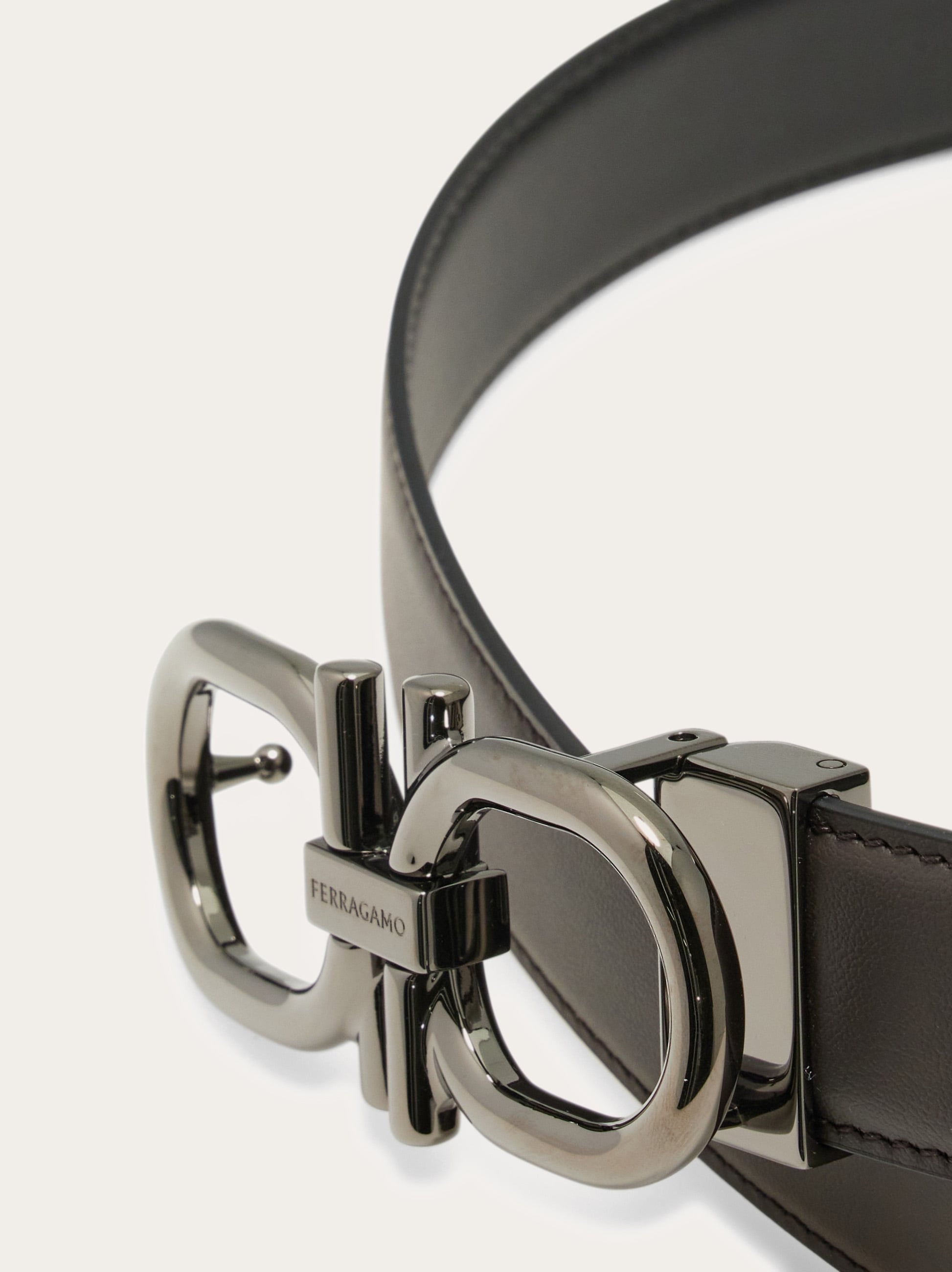 Reversible and adjustable Gancini belt - Men | Ferragamo