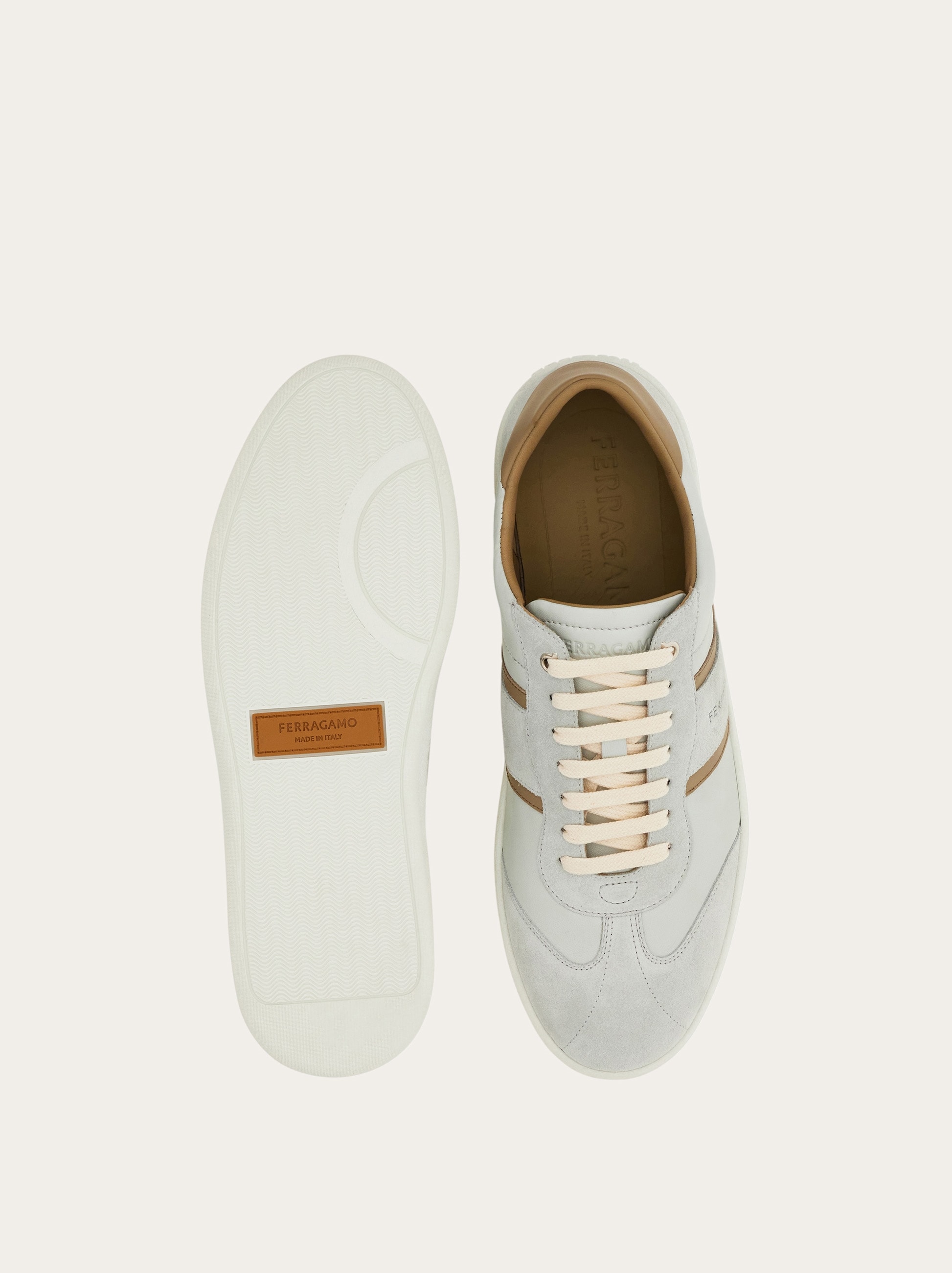 Low-top sneaker with signature detail - Men | Ferragamo