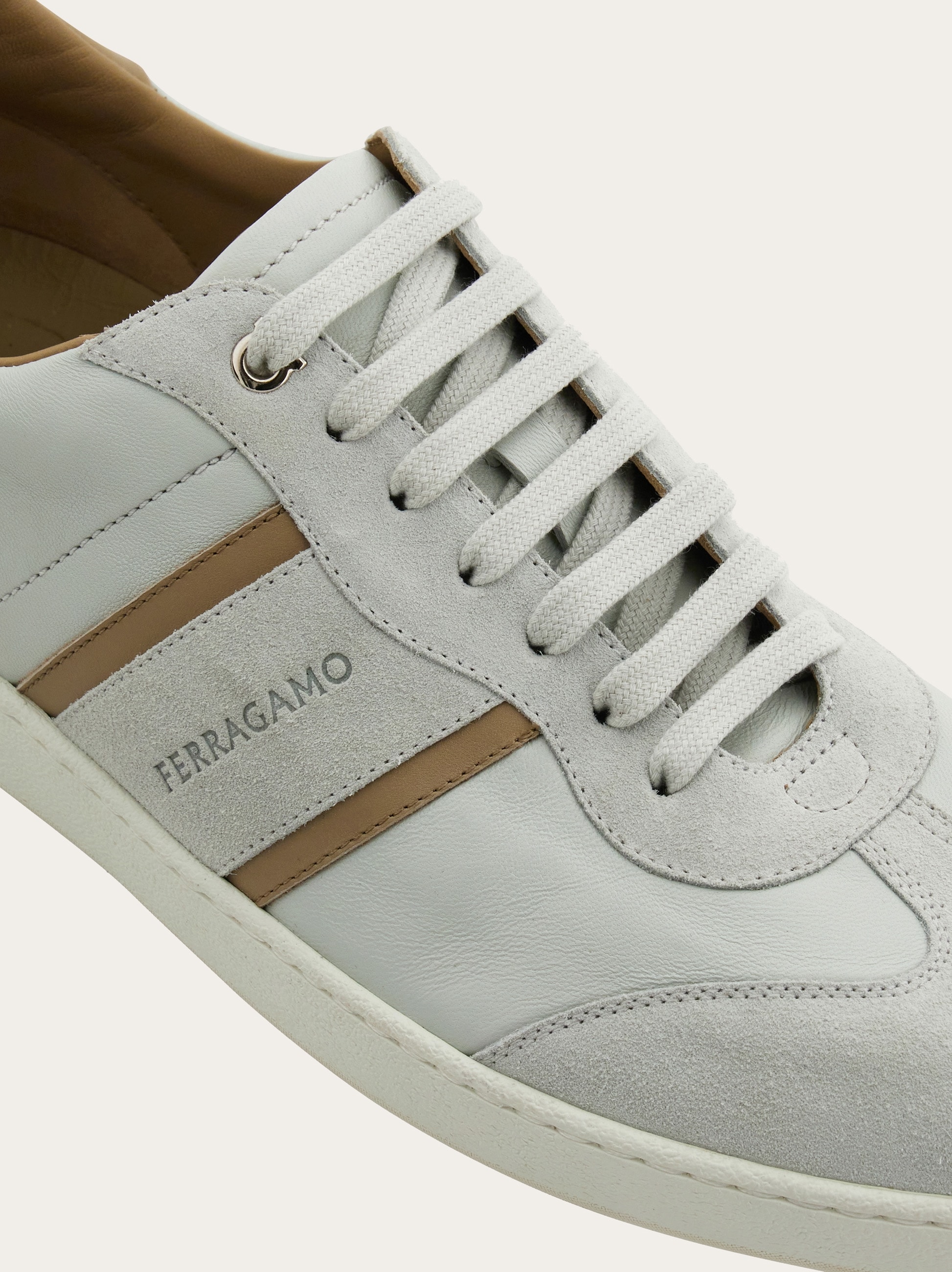 Low-top sneaker with signature detail - Men | Ferragamo