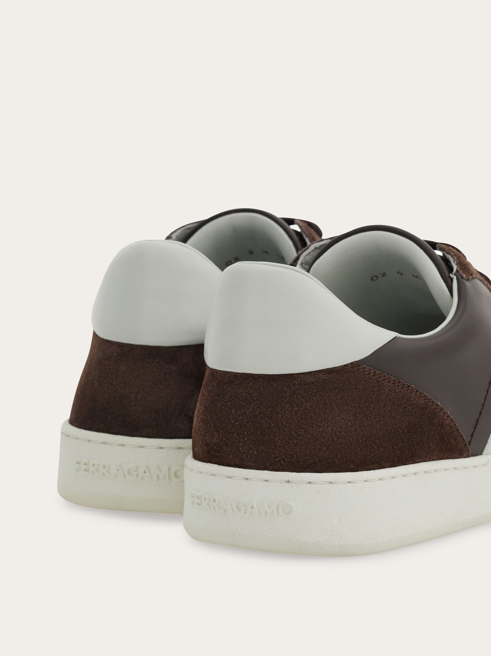 Low-top sneaker with signature detail - Men | Ferragamo
