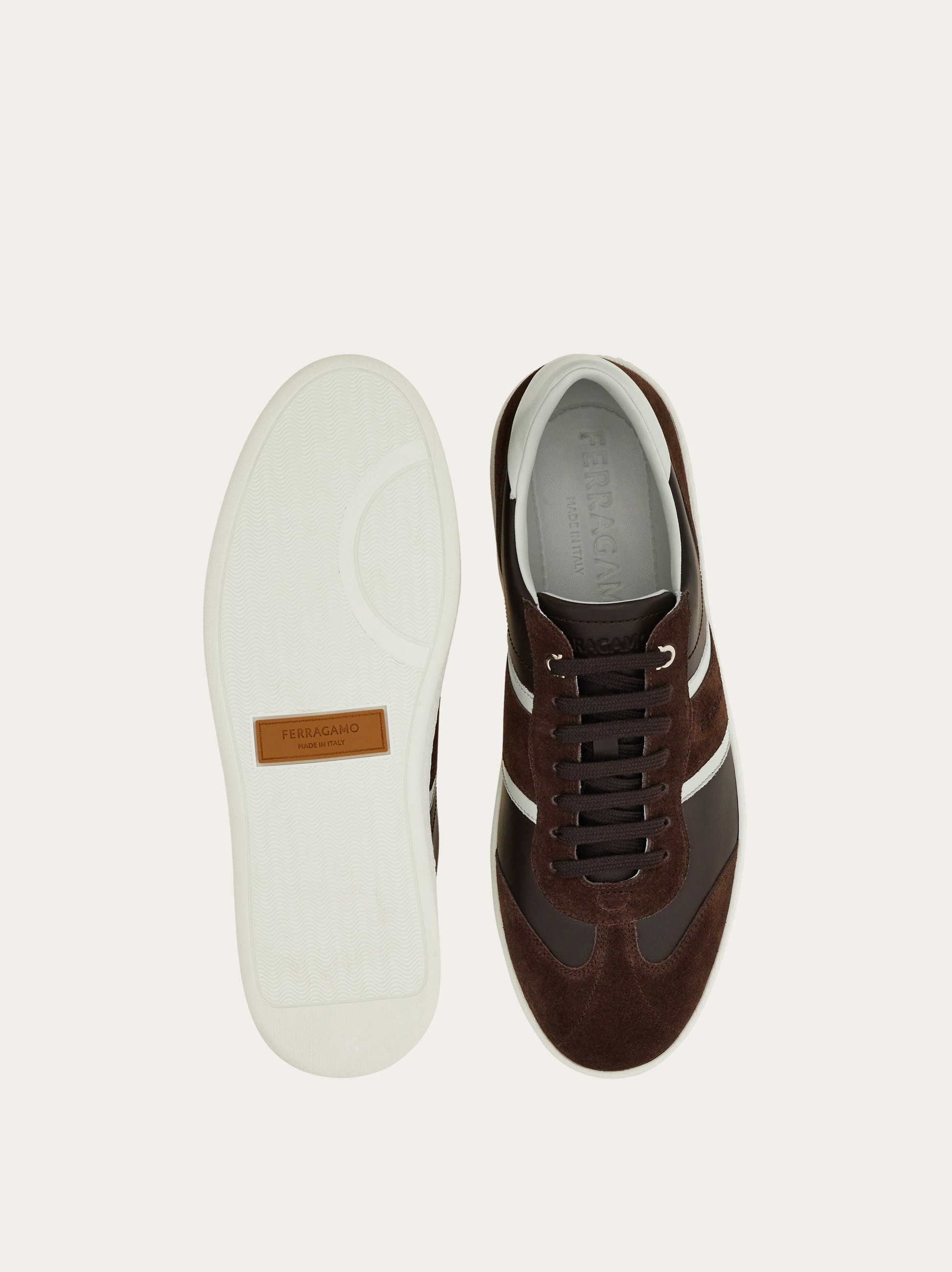 Low-top sneaker with signature detail - Men | Ferragamo