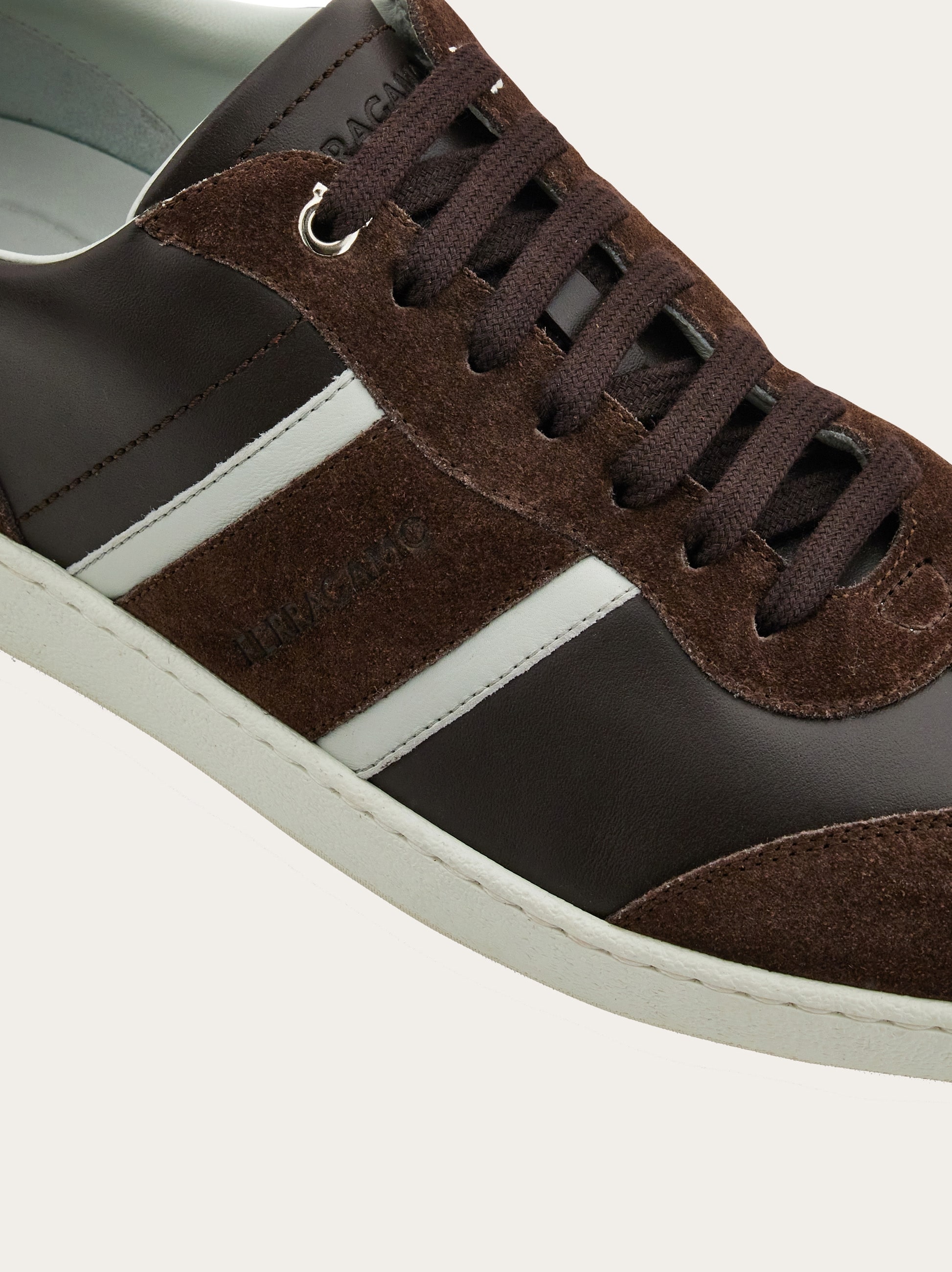 Low-top sneaker with signature detail - Men | Ferragamo