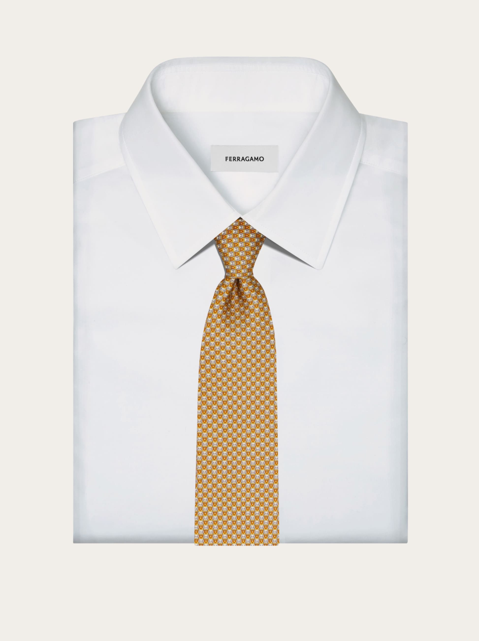 Gancini letter print silk tie - Men | Ferragamo