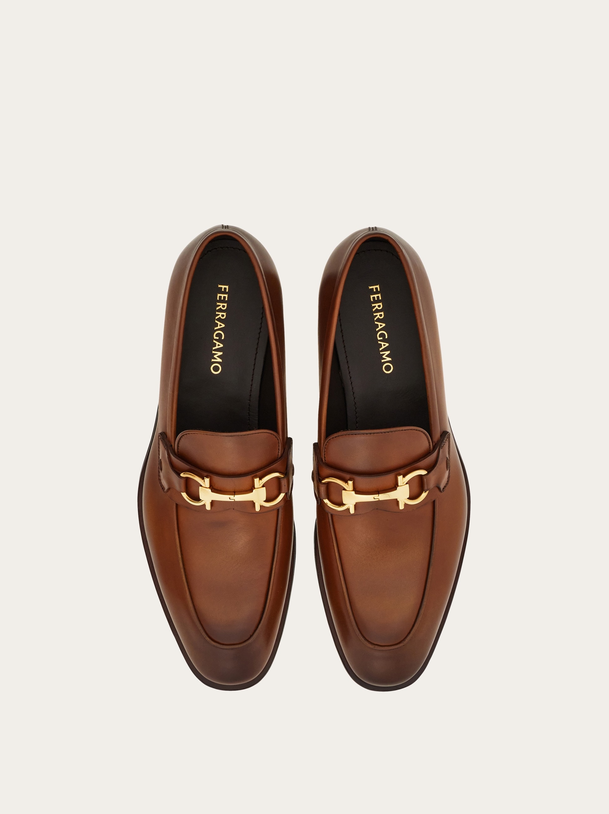 Loafer with Gancini buckle - Men | Ferragamo