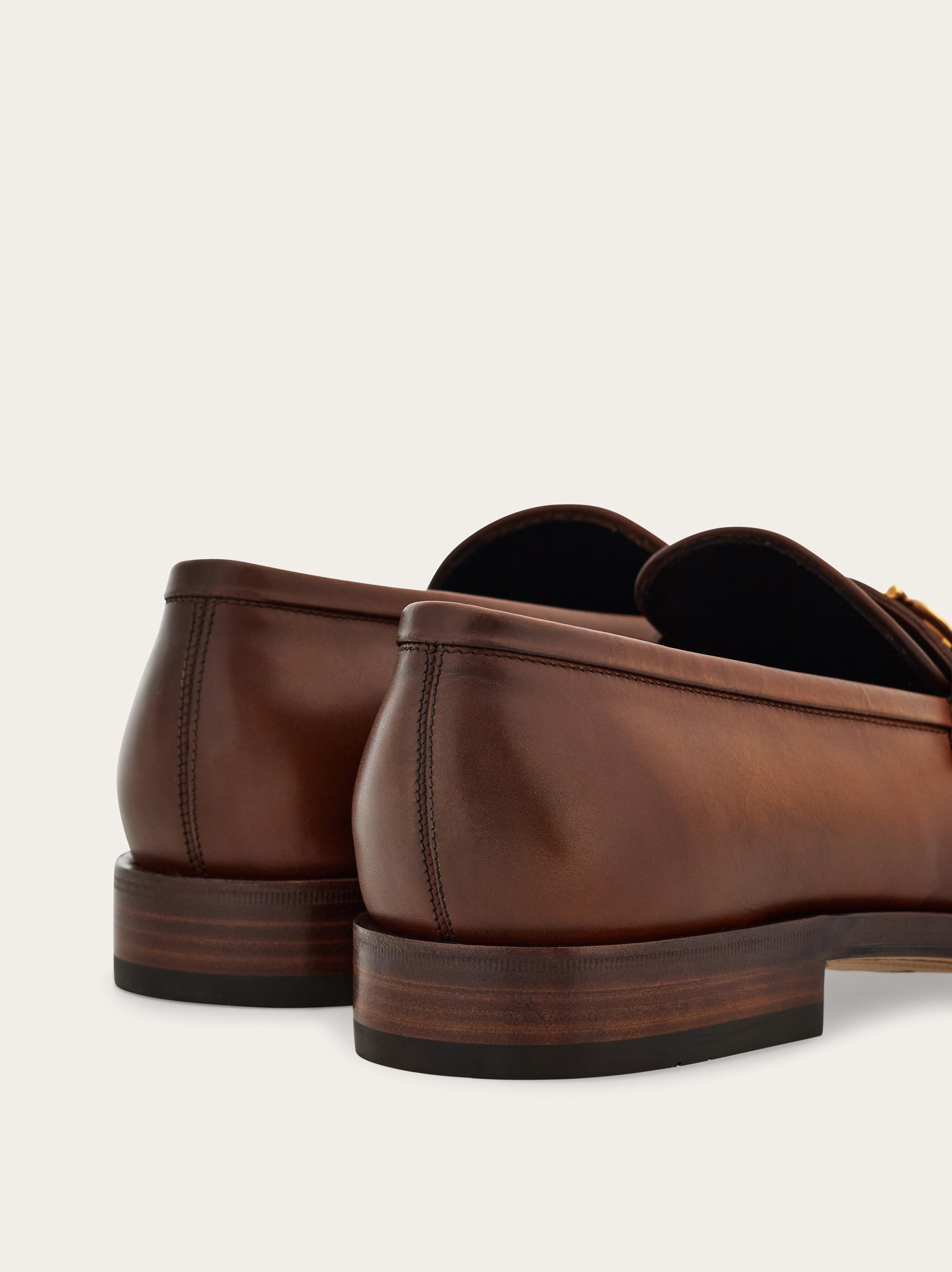Loafer with Gancini buckle - Men | Ferragamo