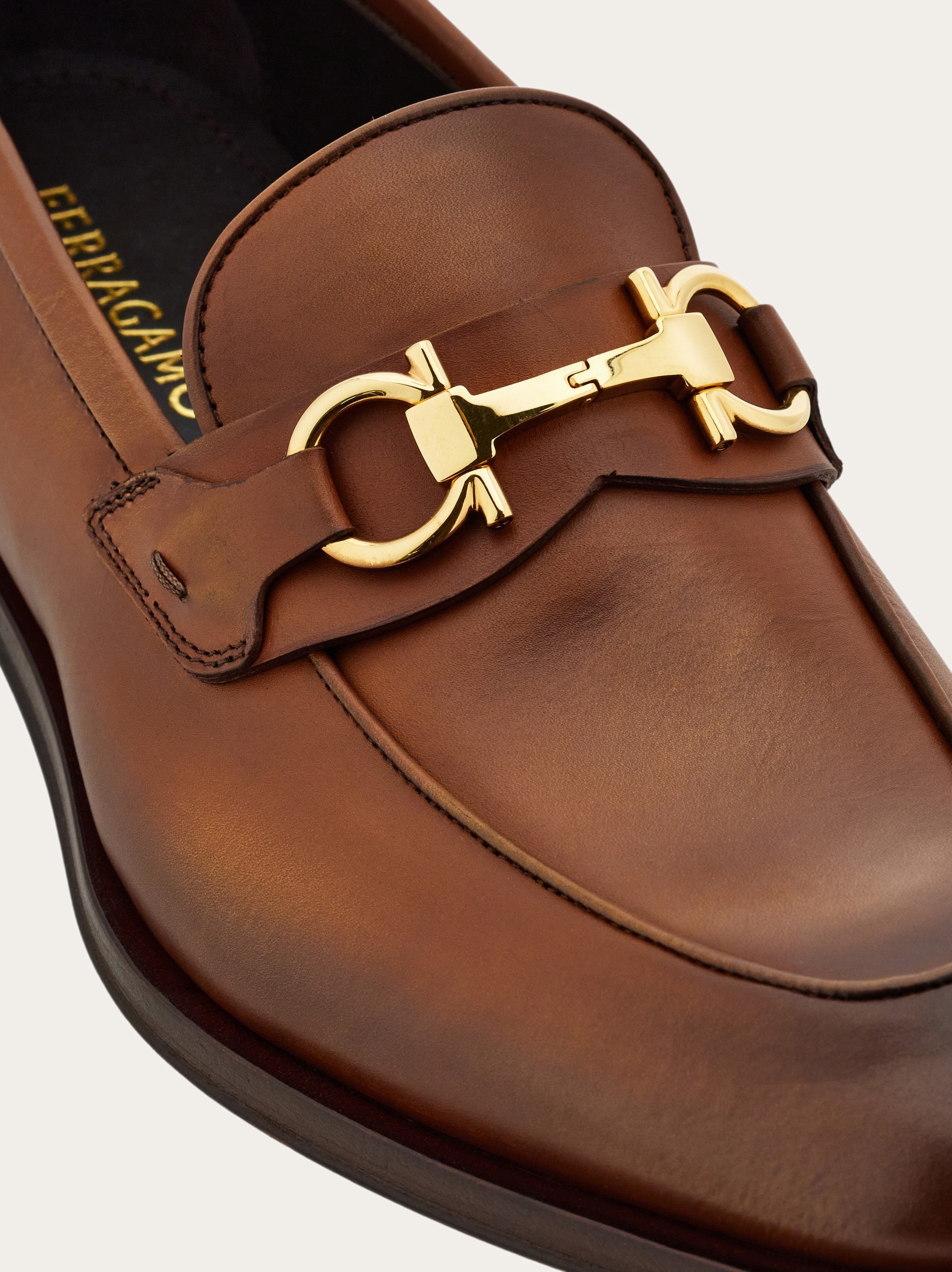 Loafer with Gancini buckle - Men | Ferragamo