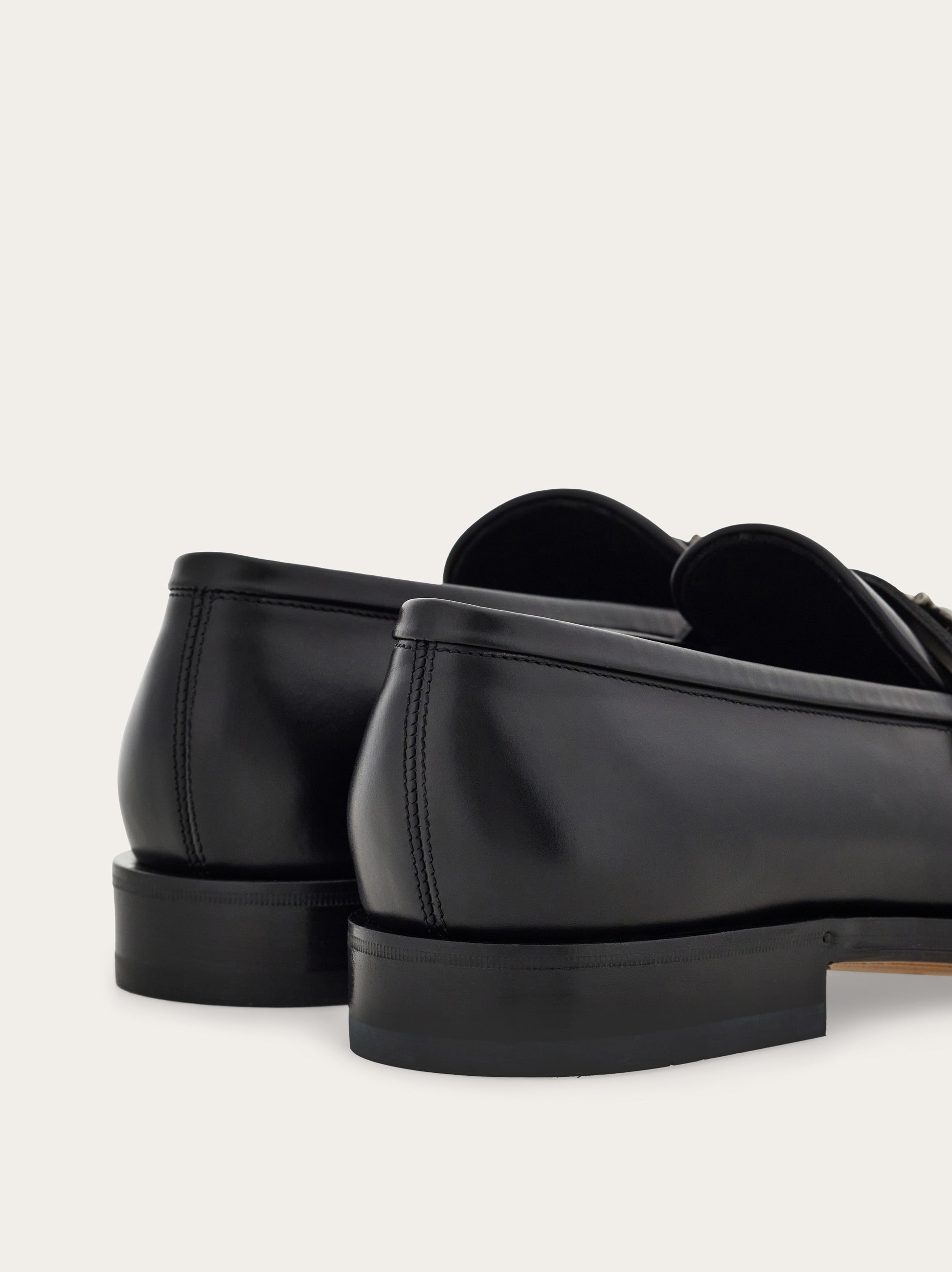 Loafer with Gancini buckle - Men | Ferragamo