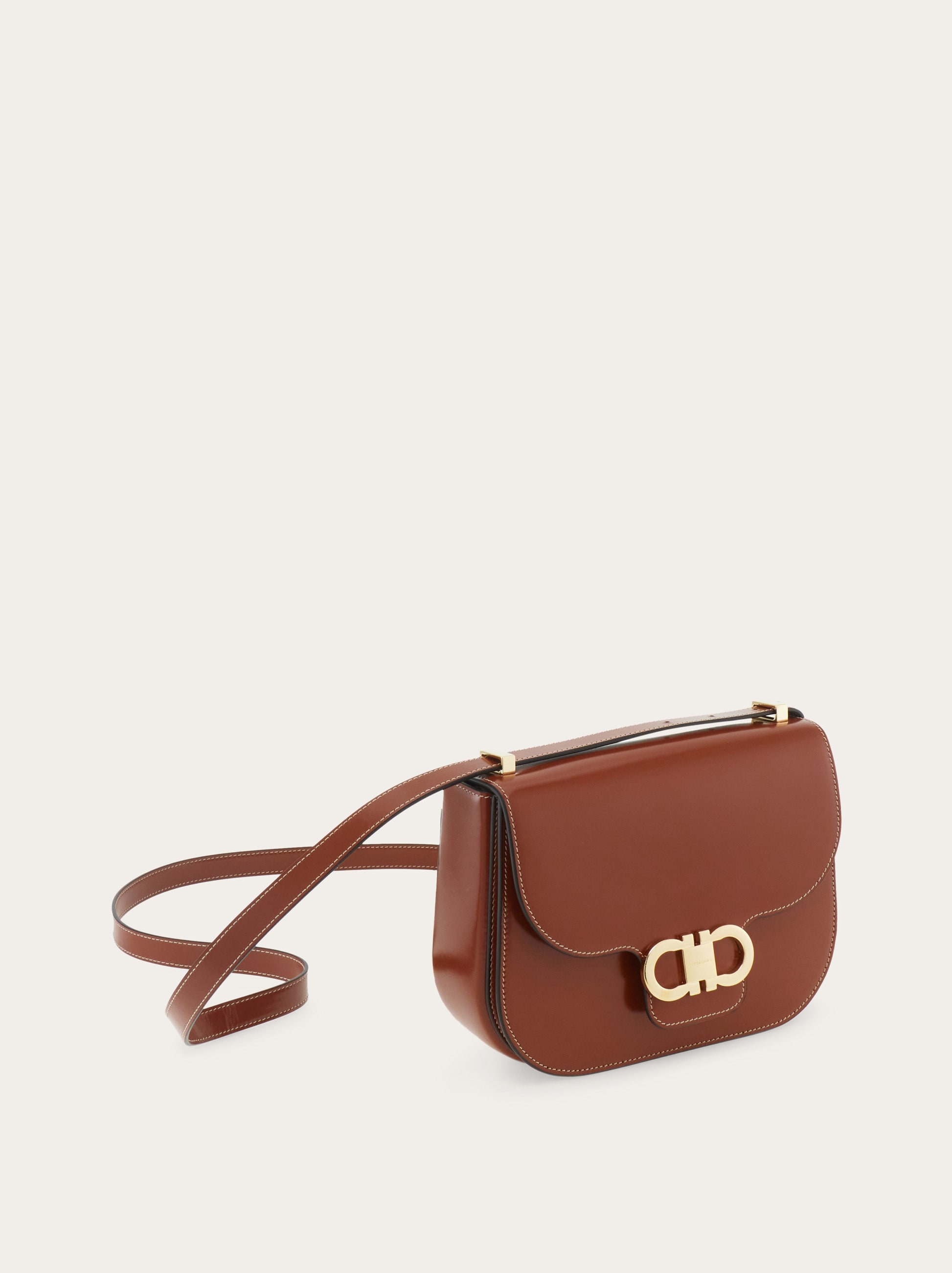 Double Gancini North-South crossbody bag - Women | Ferragamo