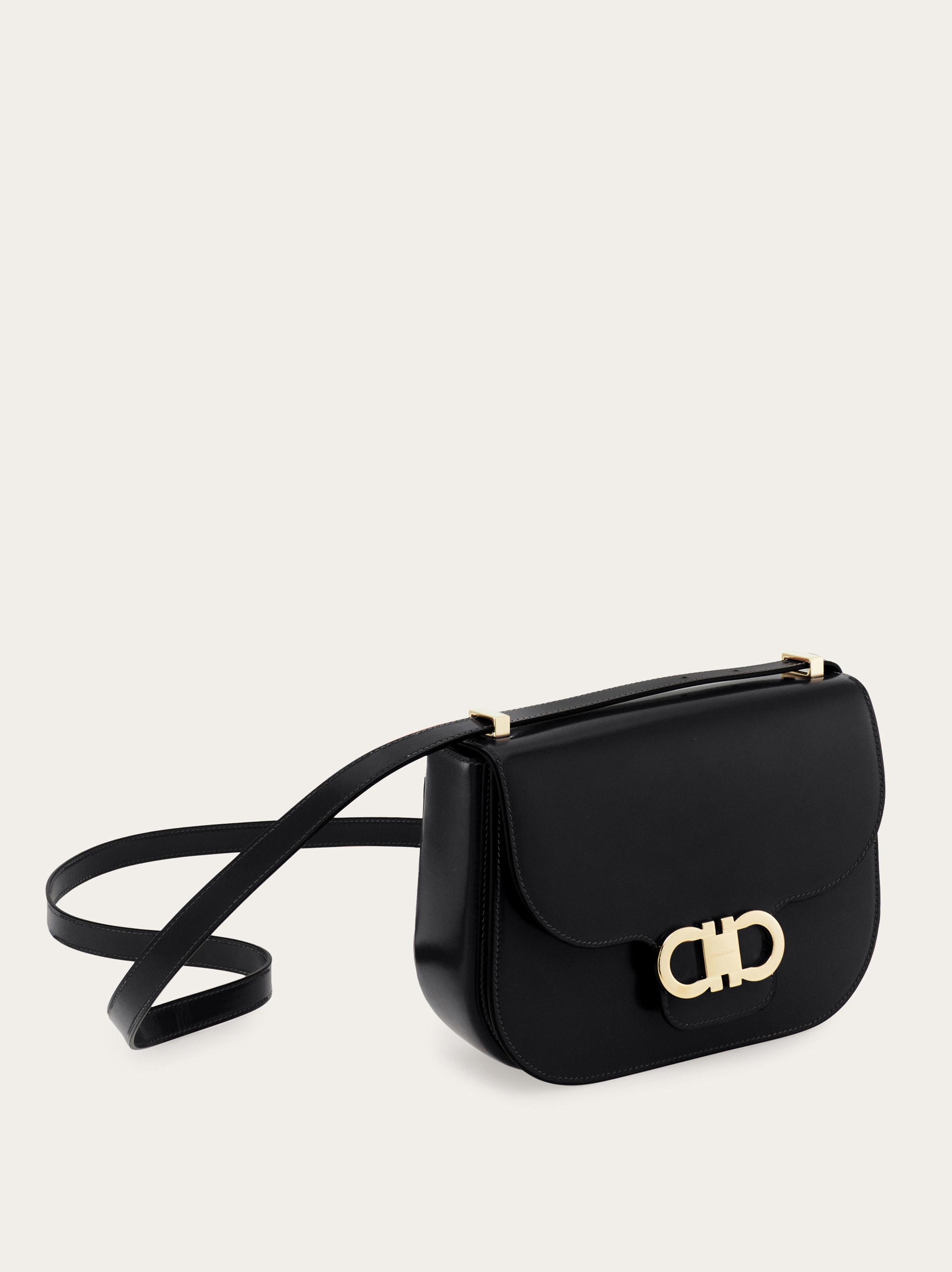 Double Gancini North-South crossbody bag - Women | Ferragamo