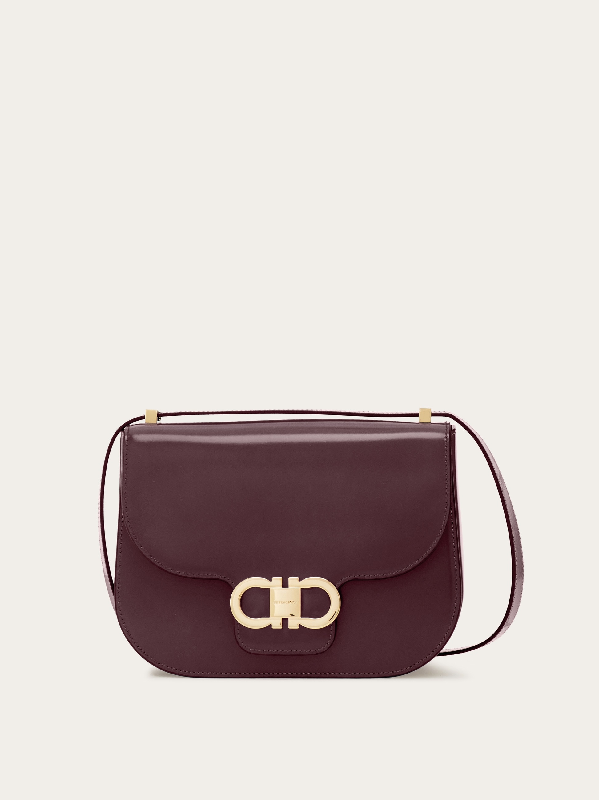 Double Gancini North-South crossbody bag - Women | Ferragamo