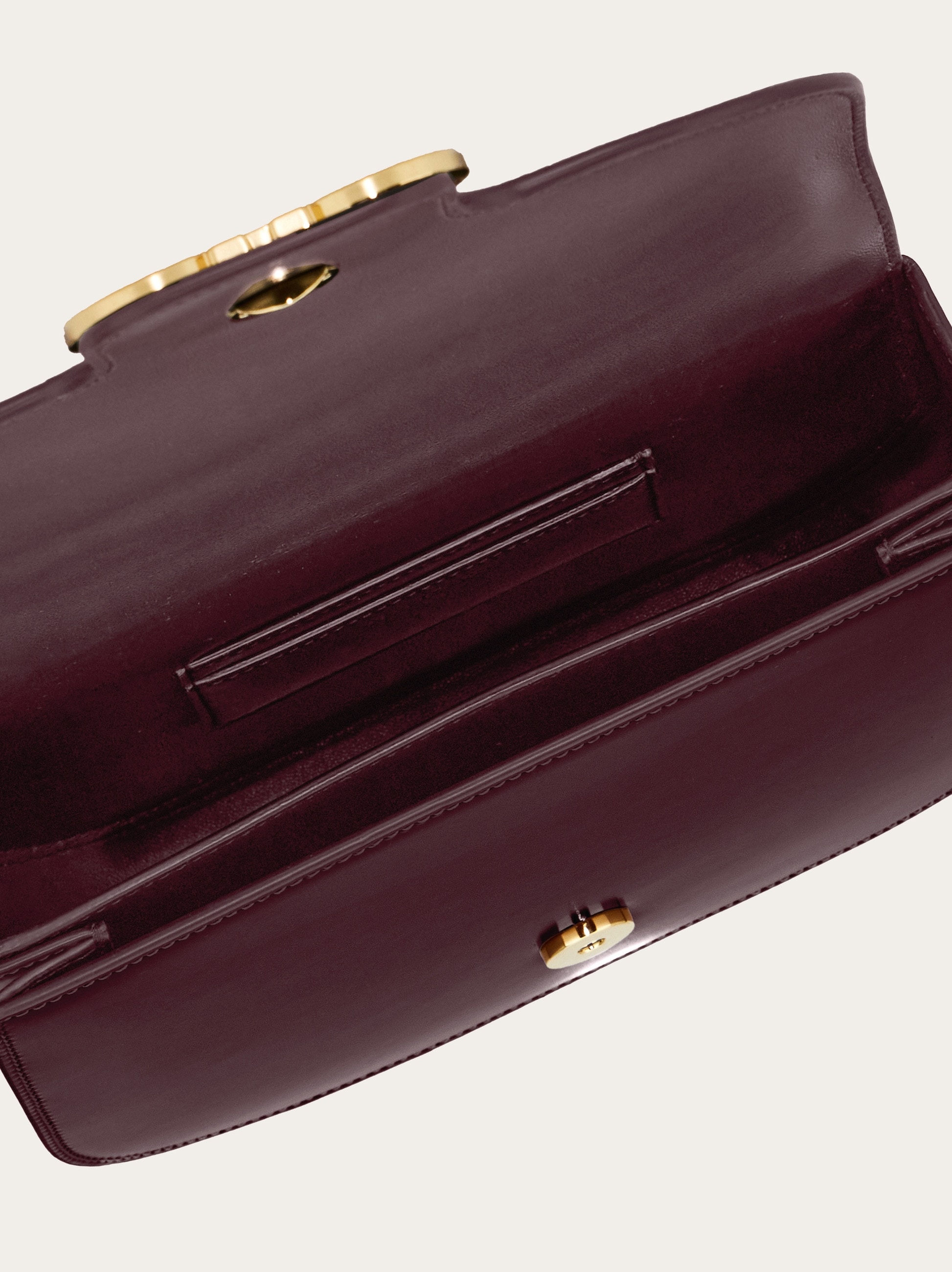 Double Gancini North-South crossbody bag - Women | Ferragamo