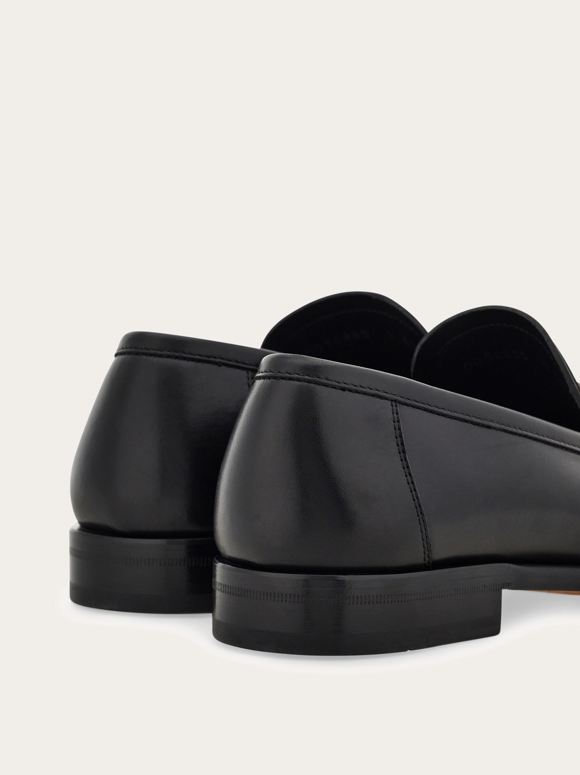 Loafer with Gancini buckle - Men | Ferragamo