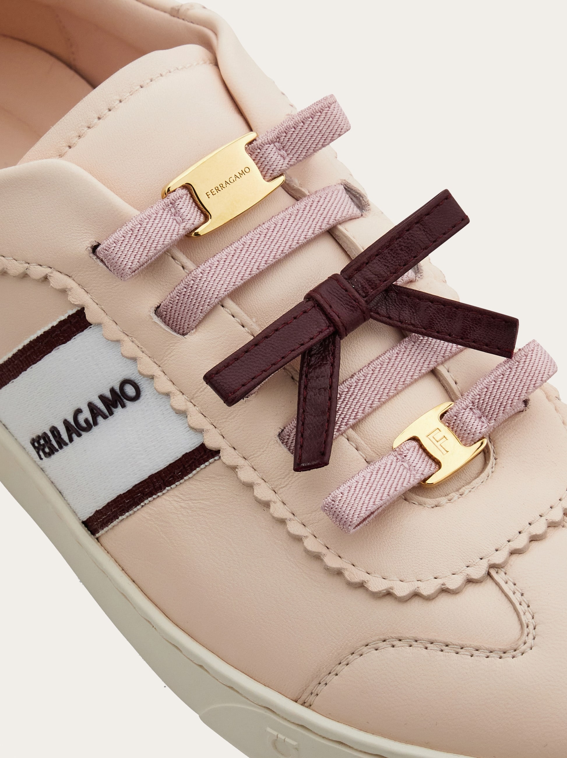 Sneaker with mini bow detail - Women | Ferragamo