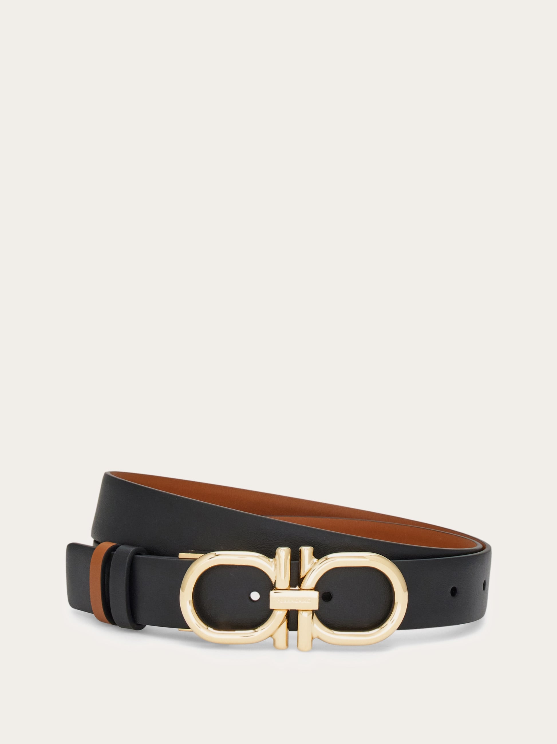 Reversible and adjustable Gancini belt - Women | Ferragamo