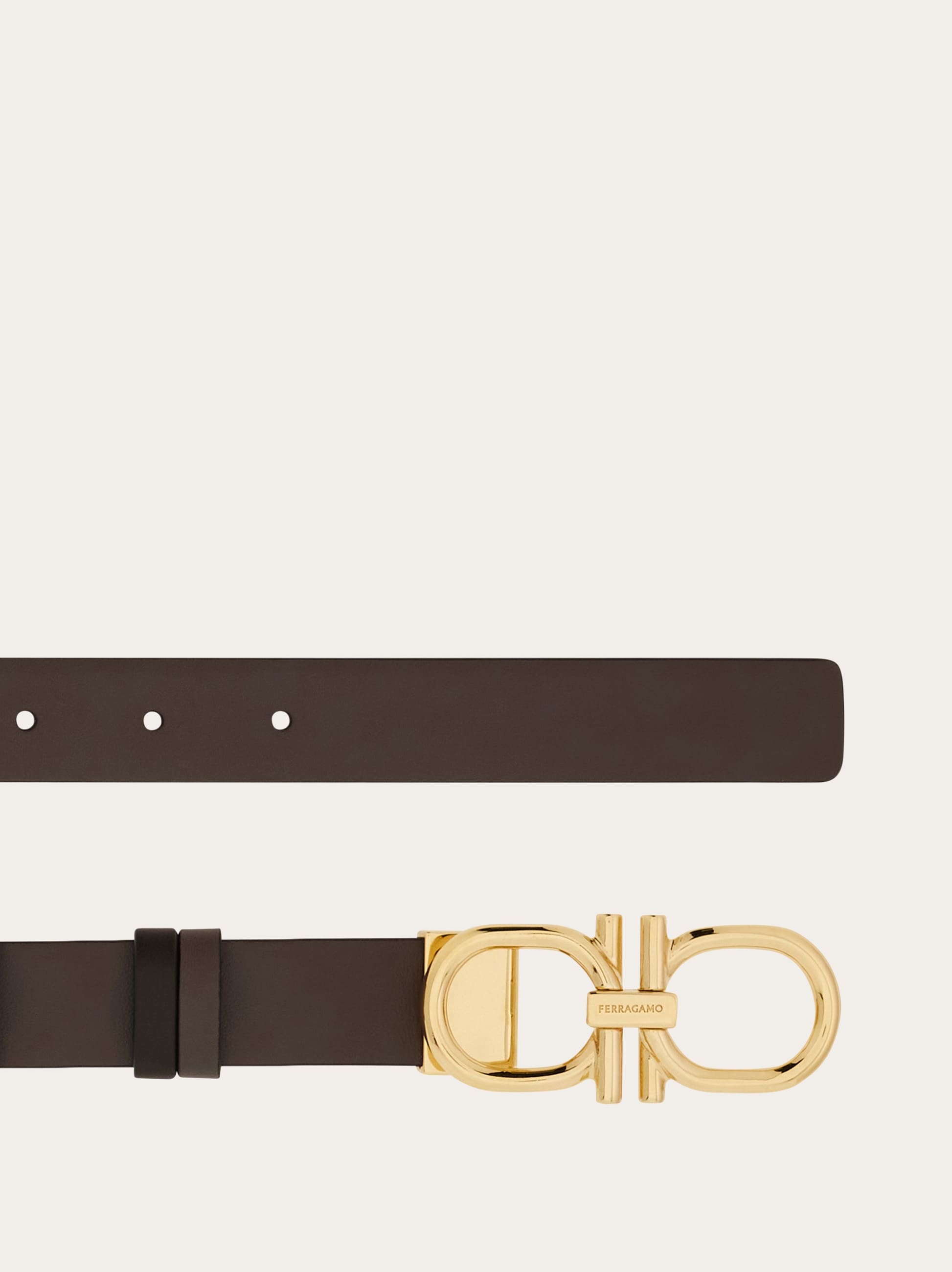 Reversible and adjustable Gancini belt - Women | Ferragamo