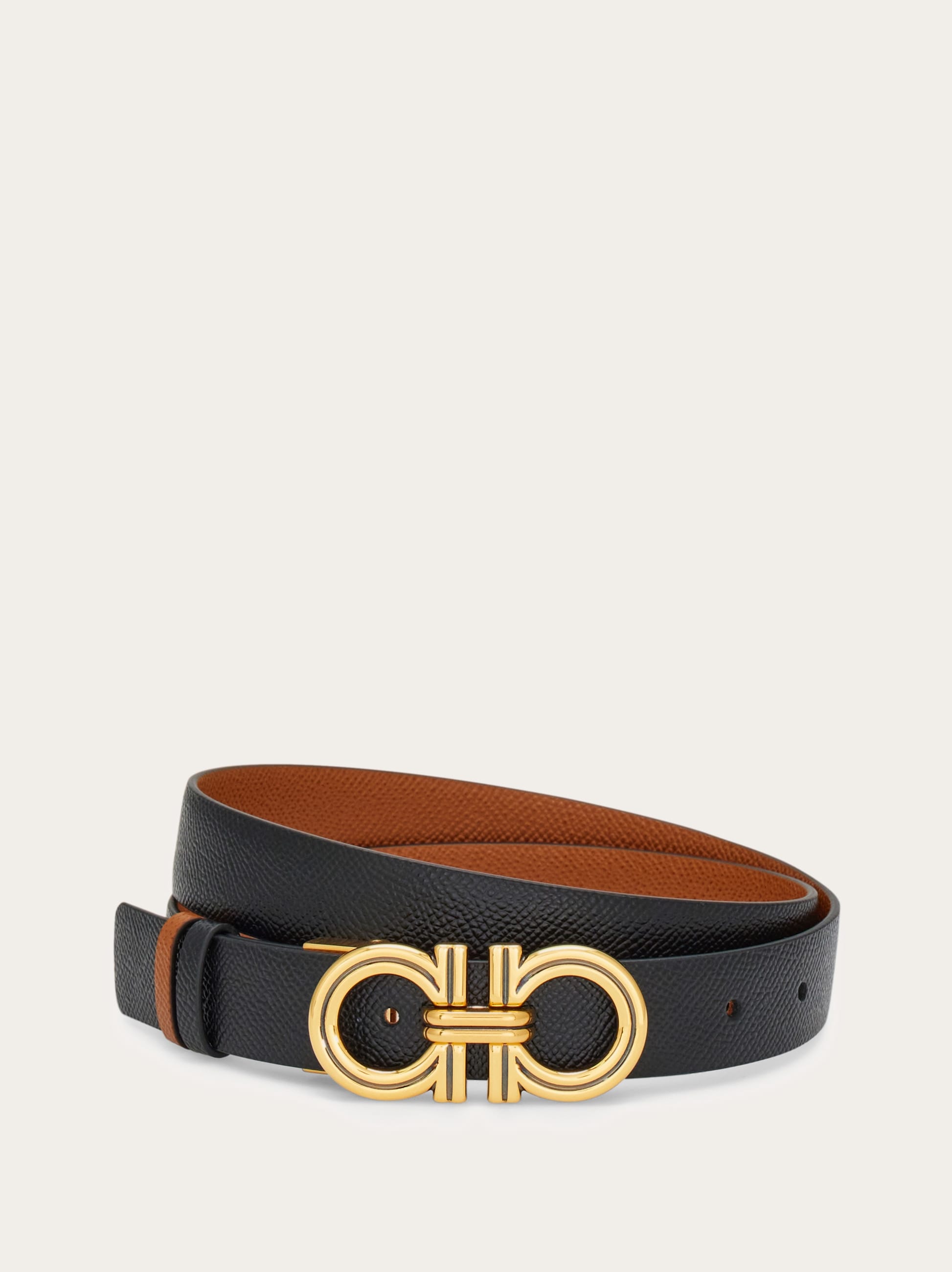 Reversible and adjustable Gancini belt - Women | Ferragamo