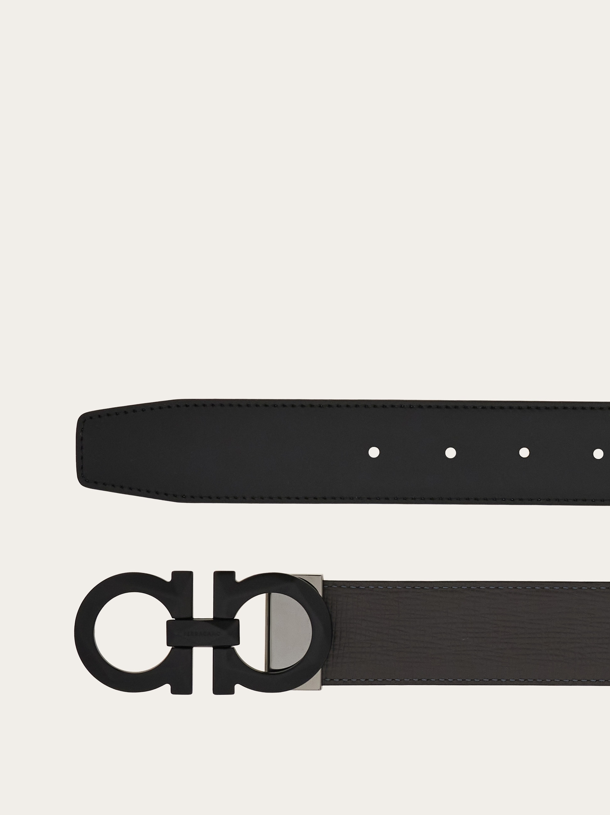 Reversible and adjustable Gancini belt - Men | Ferragamo