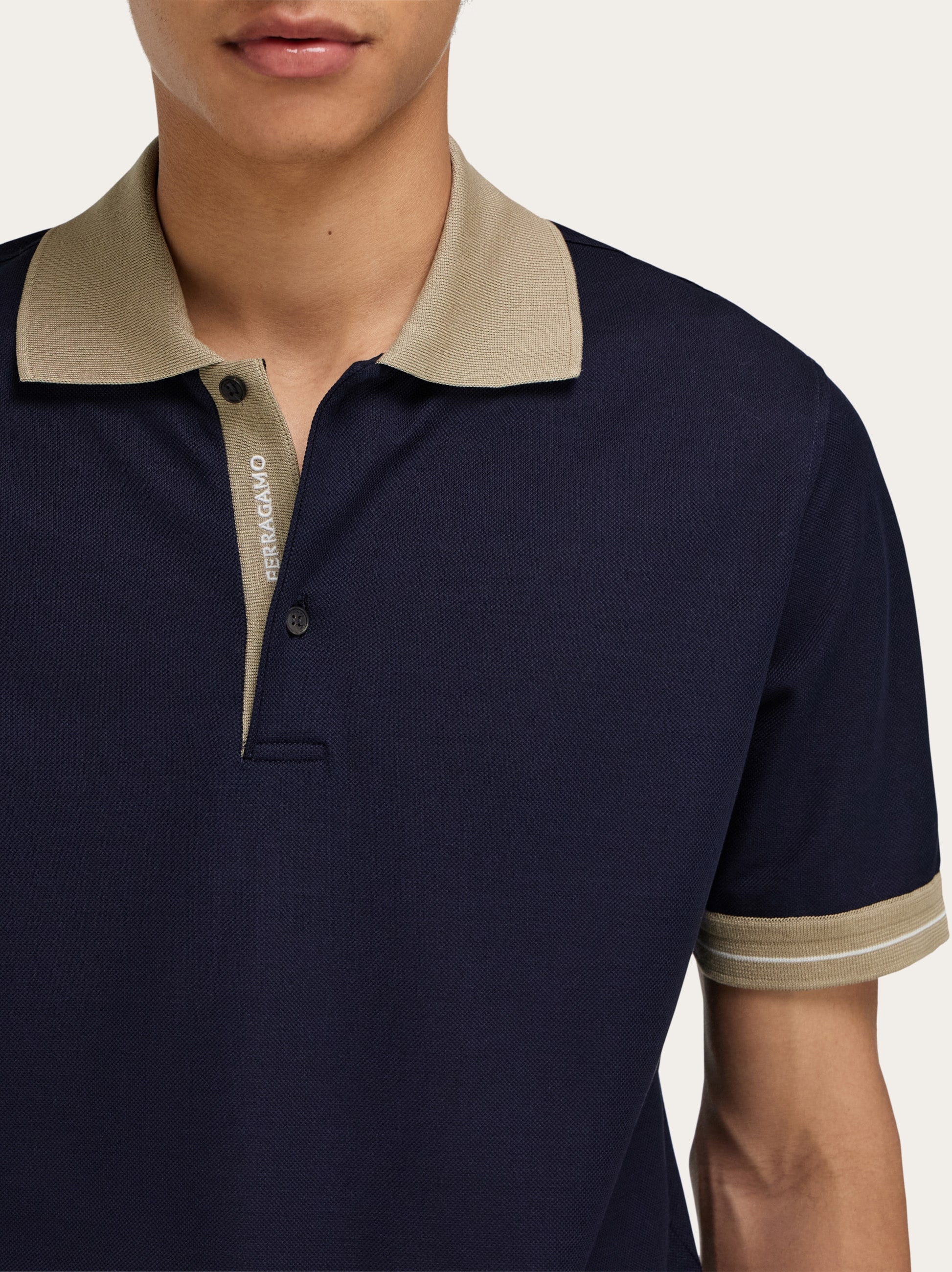 Salvatore Ferragamo ネイビー ポロシャツ Polo with zip collar - Men | Ferragamo