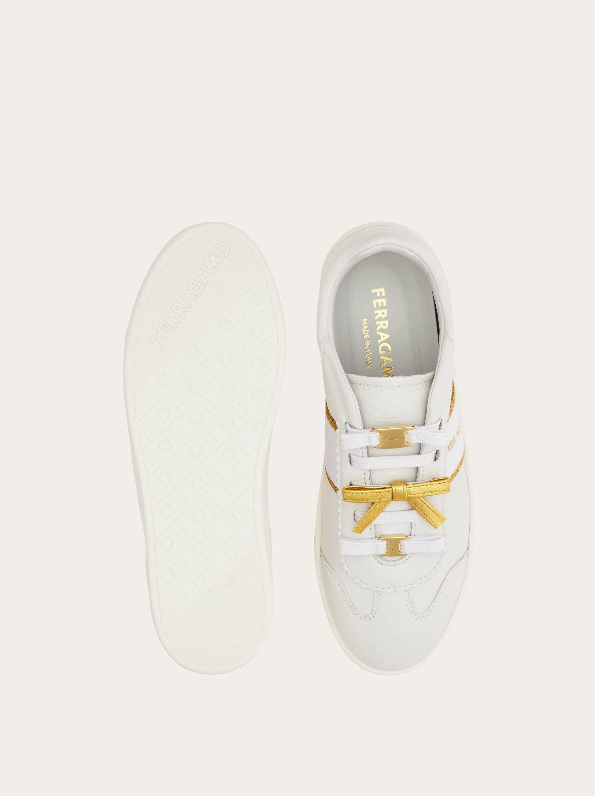 Sneaker with mini bow detail - Women | Ferragamo