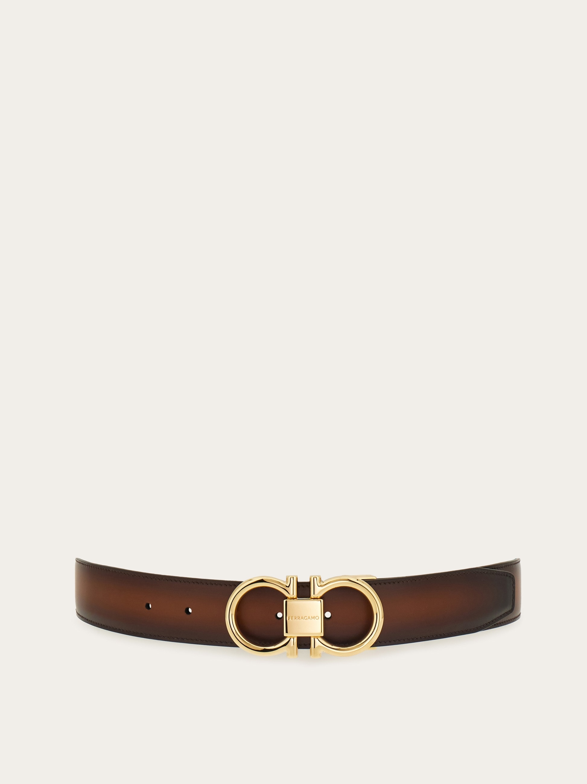 Reversible and adjustable Gancini belt - Men | Ferragamo