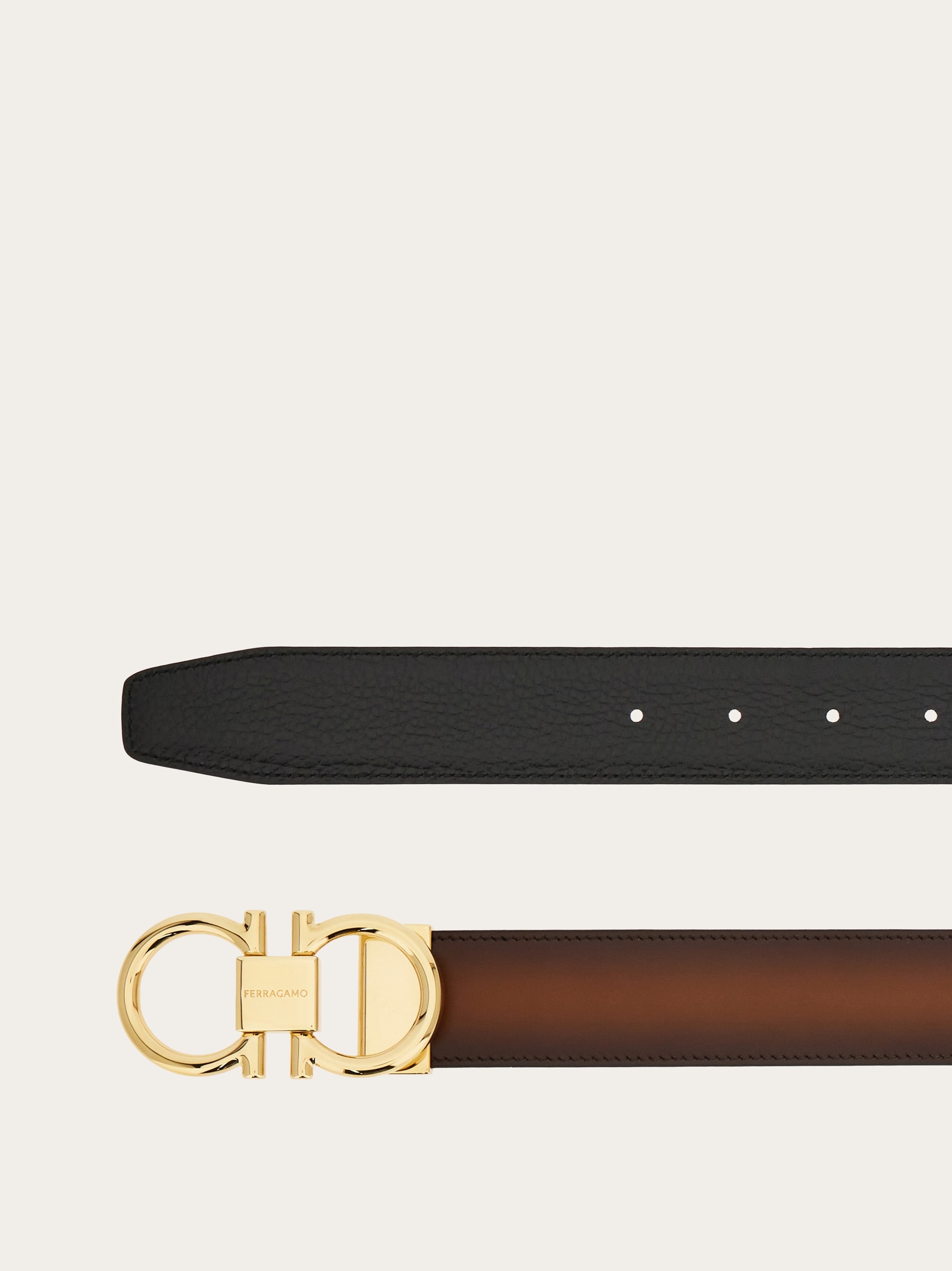 Reversible and adjustable Gancini belt - Men | Ferragamo