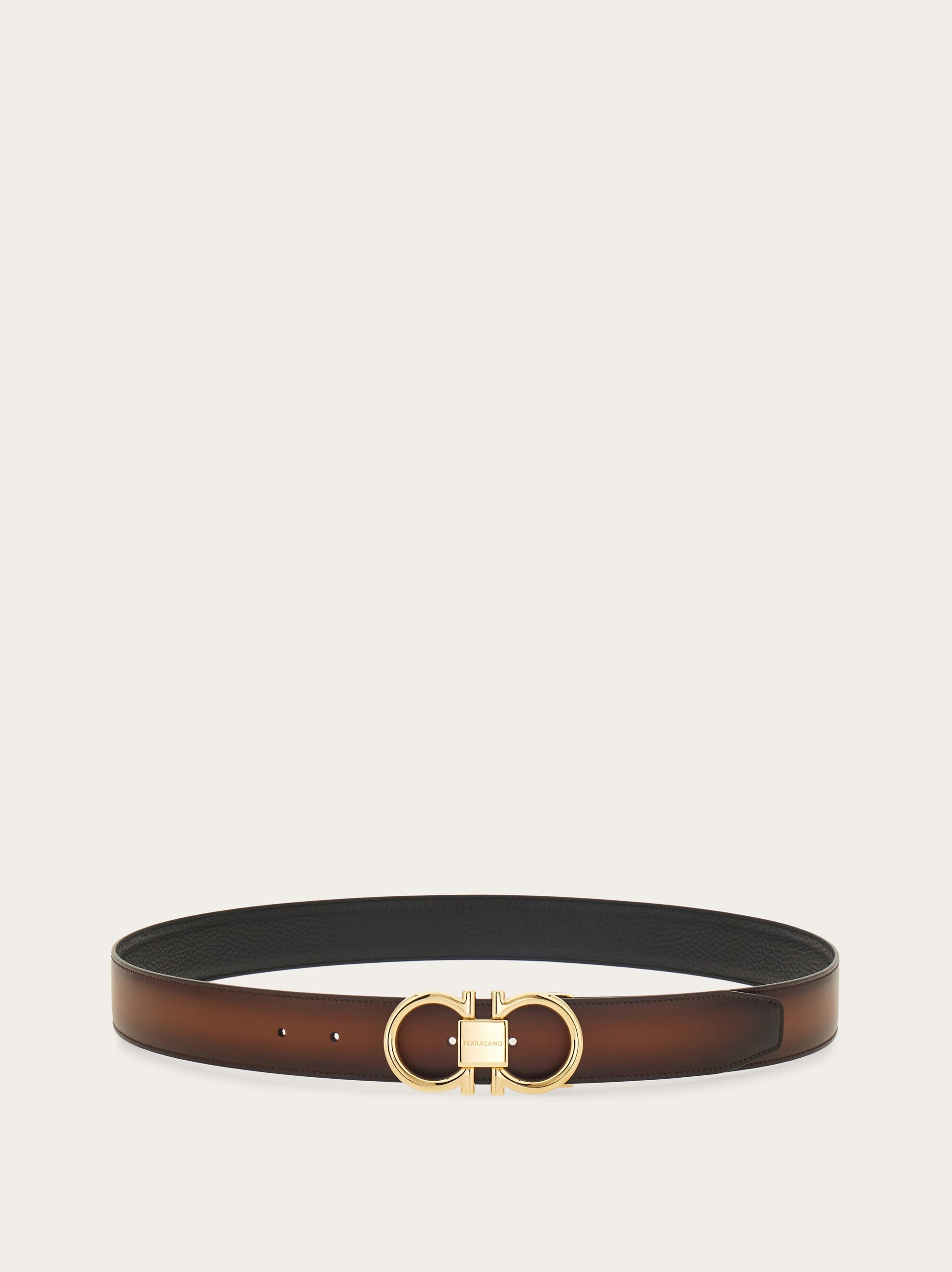 Reversible and adjustable Gancini belt - Men | Ferragamo