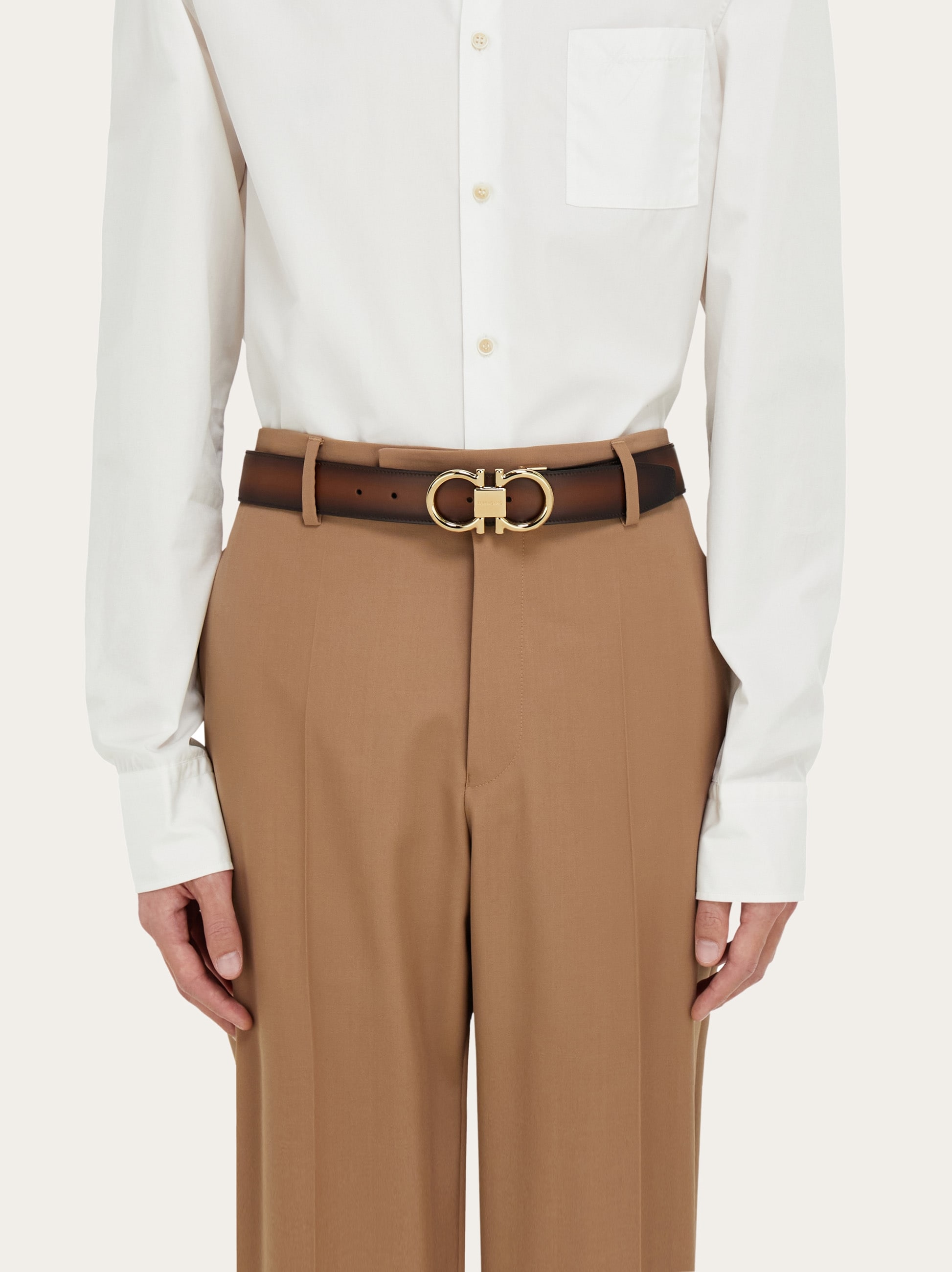 Reversible and adjustable Gancini belt - Men | Ferragamo